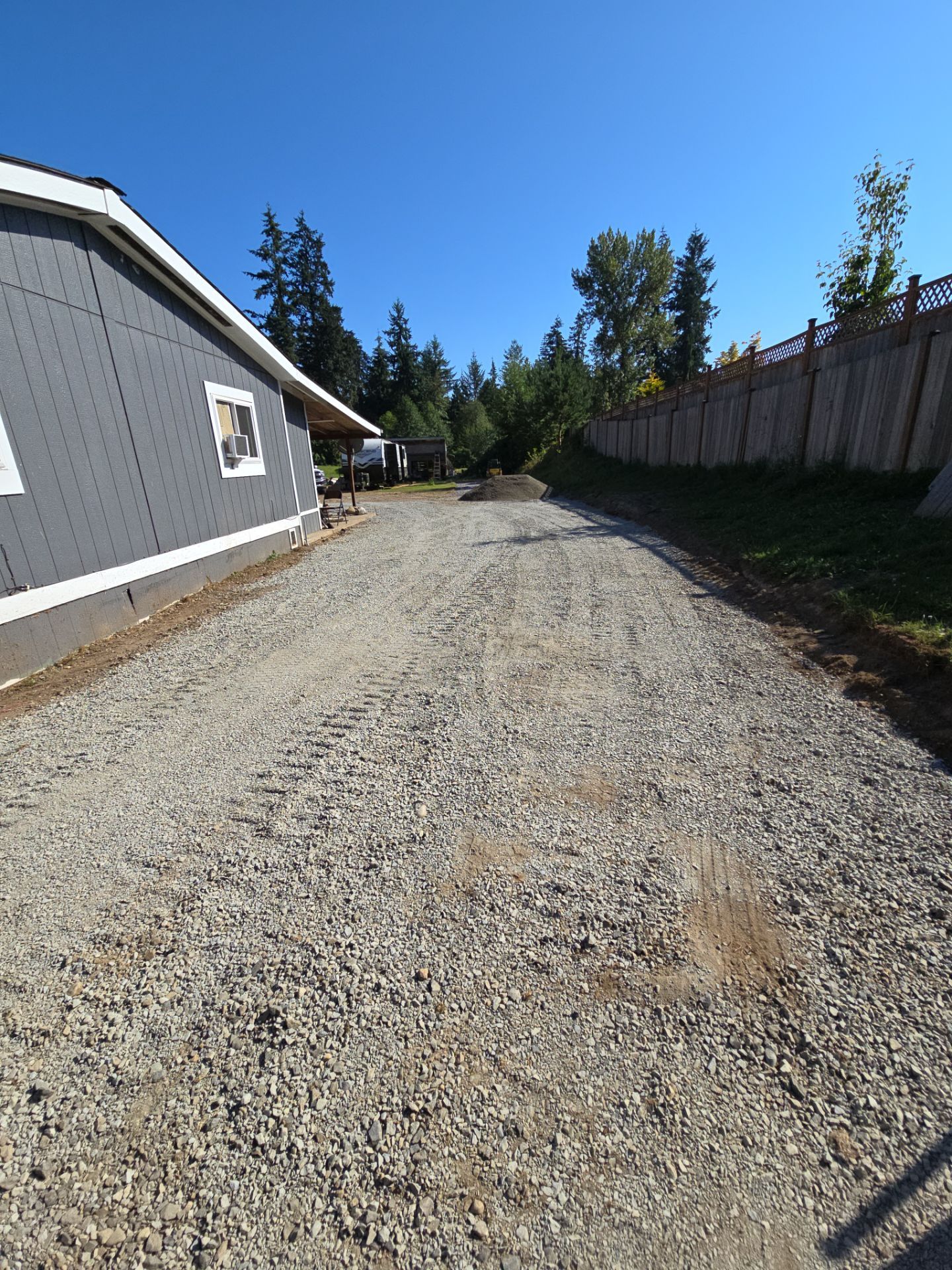 Joann | Asphalt Driveway & Retaining Wall  by Jireh Asphalt & Concrete Inc 