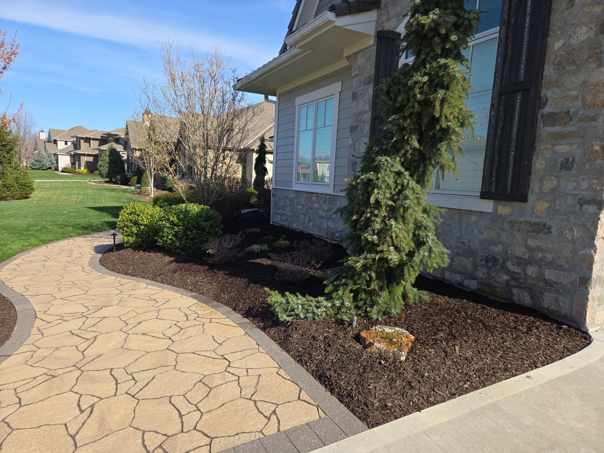 Front Yard Landscape and Walkway Renovation in Overland Park by LAND ESCAPES LLC