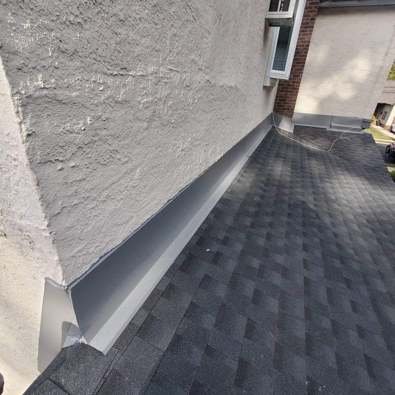 New Roof & Gutters by Island Roofing Inc.