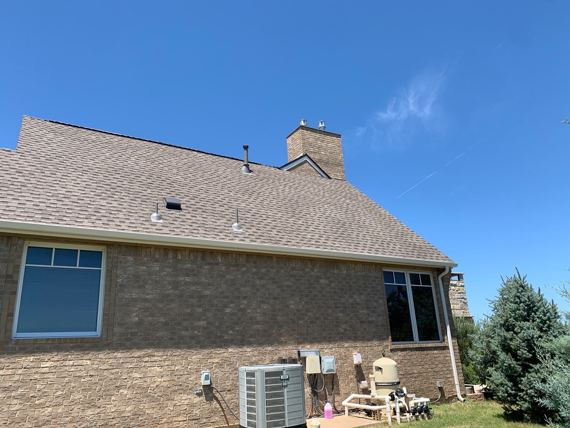 Roof Replacement and Gutter Installation in Edmond, OK by McCann's Roofing and Construction
