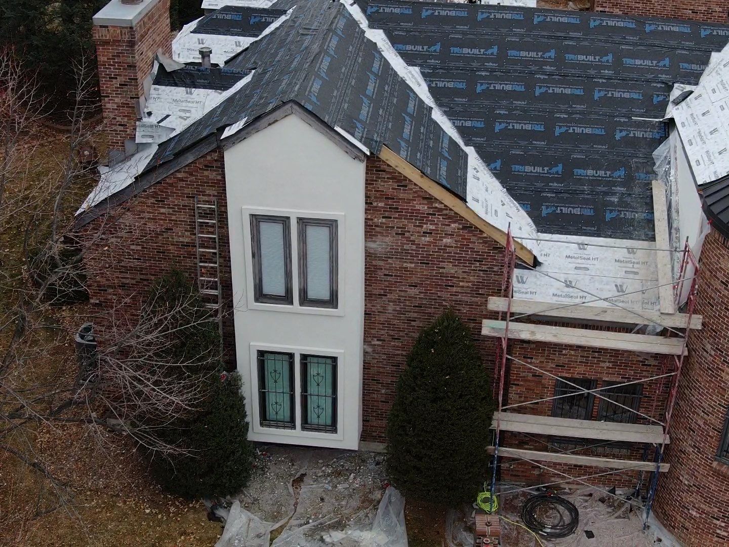 Unified Stone Coated Roof & Stucco Remodle by Blue Peaks Roofing LLC