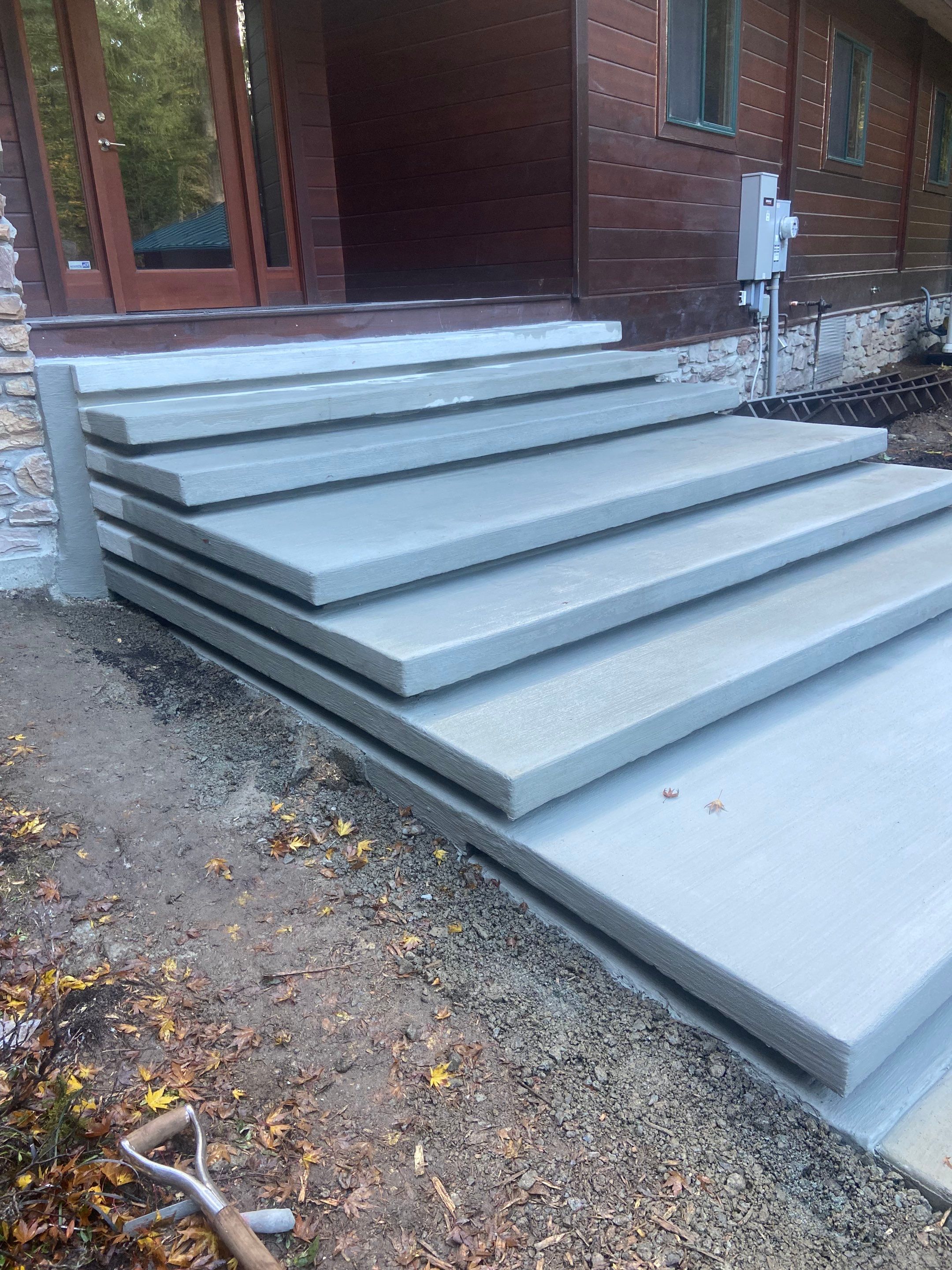 Pia | Custom Concrete Driveway, Walkway & Floating Steps by Jireh Asphalt & Concrete Inc 