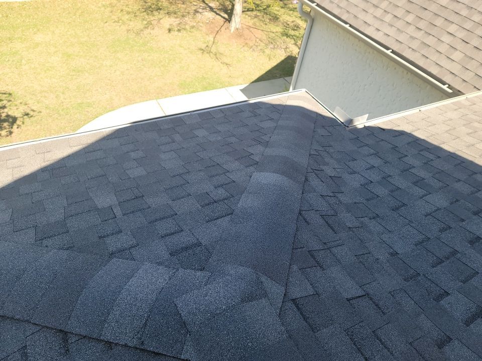 Residential Roofing Installation using Roof Replacement by American Roofing & Construction LLC