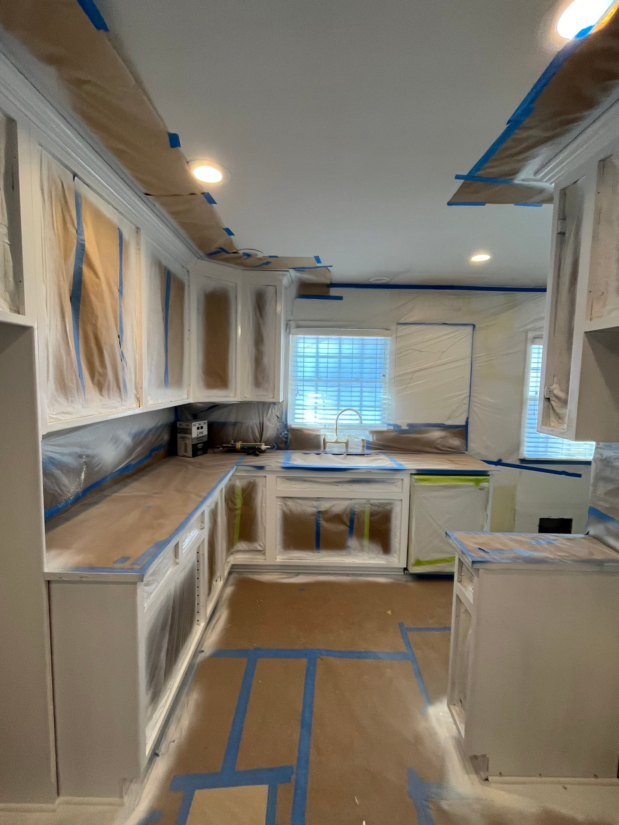 Elegant Transformation: Stained Cabinets Revamped with Sherwin-Williams Juniper by Cougar Painting