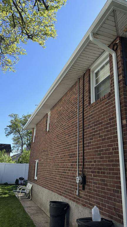 New Gutter & Fascia Wrap by Island Roofing Inc.