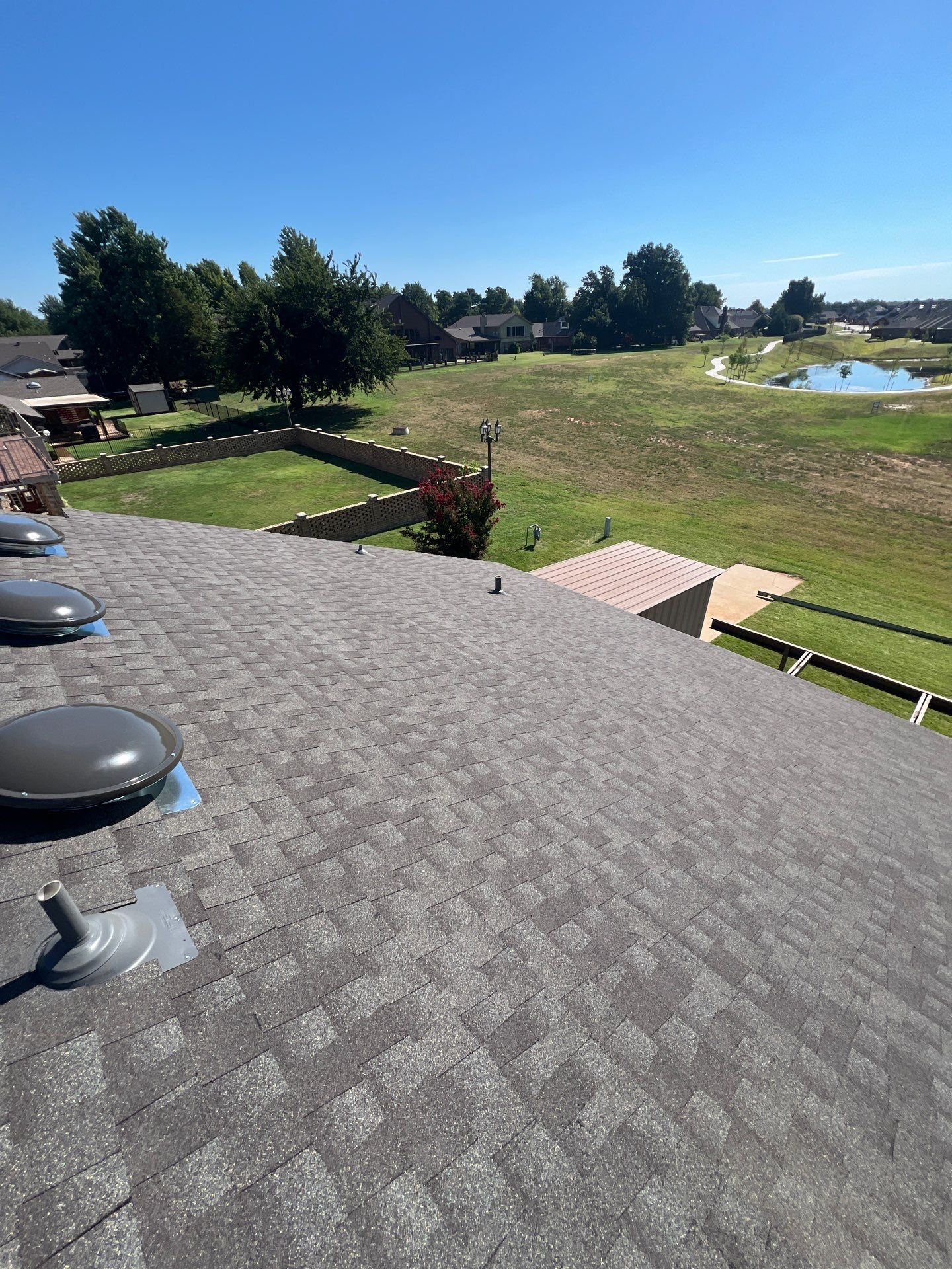 Roof Replacement and Skylight Replacement in Yukon by McCann's Roofing and Construction