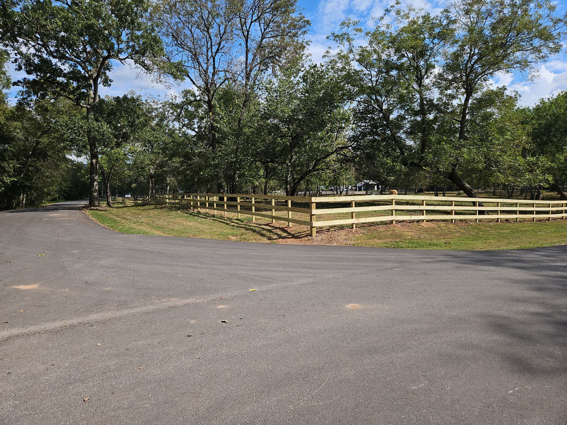 Ranch Style fence Plus Iron installation by Tim's Fences
