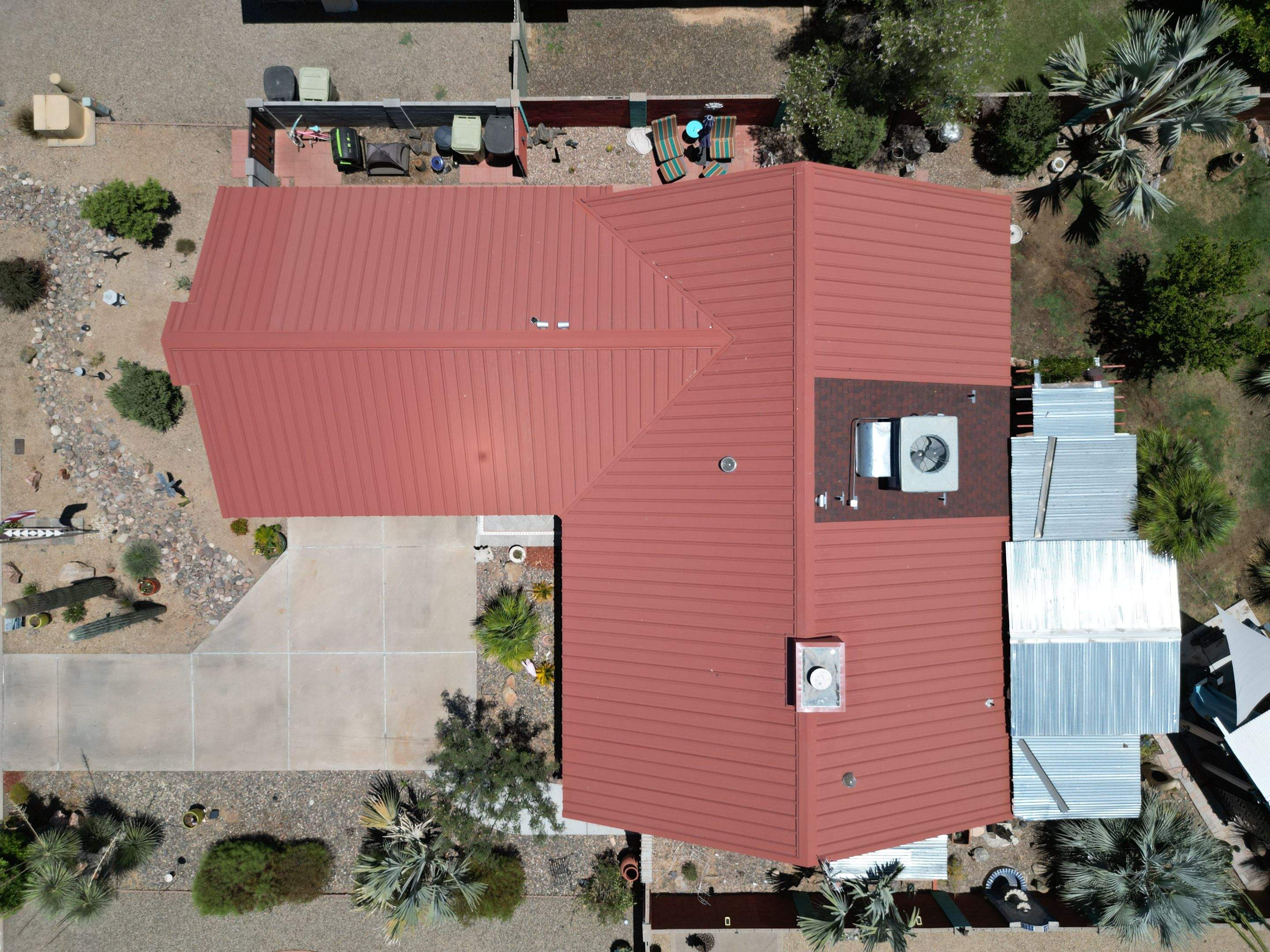 Terra Cotta Exposed Fastener by Reimagine Roofing