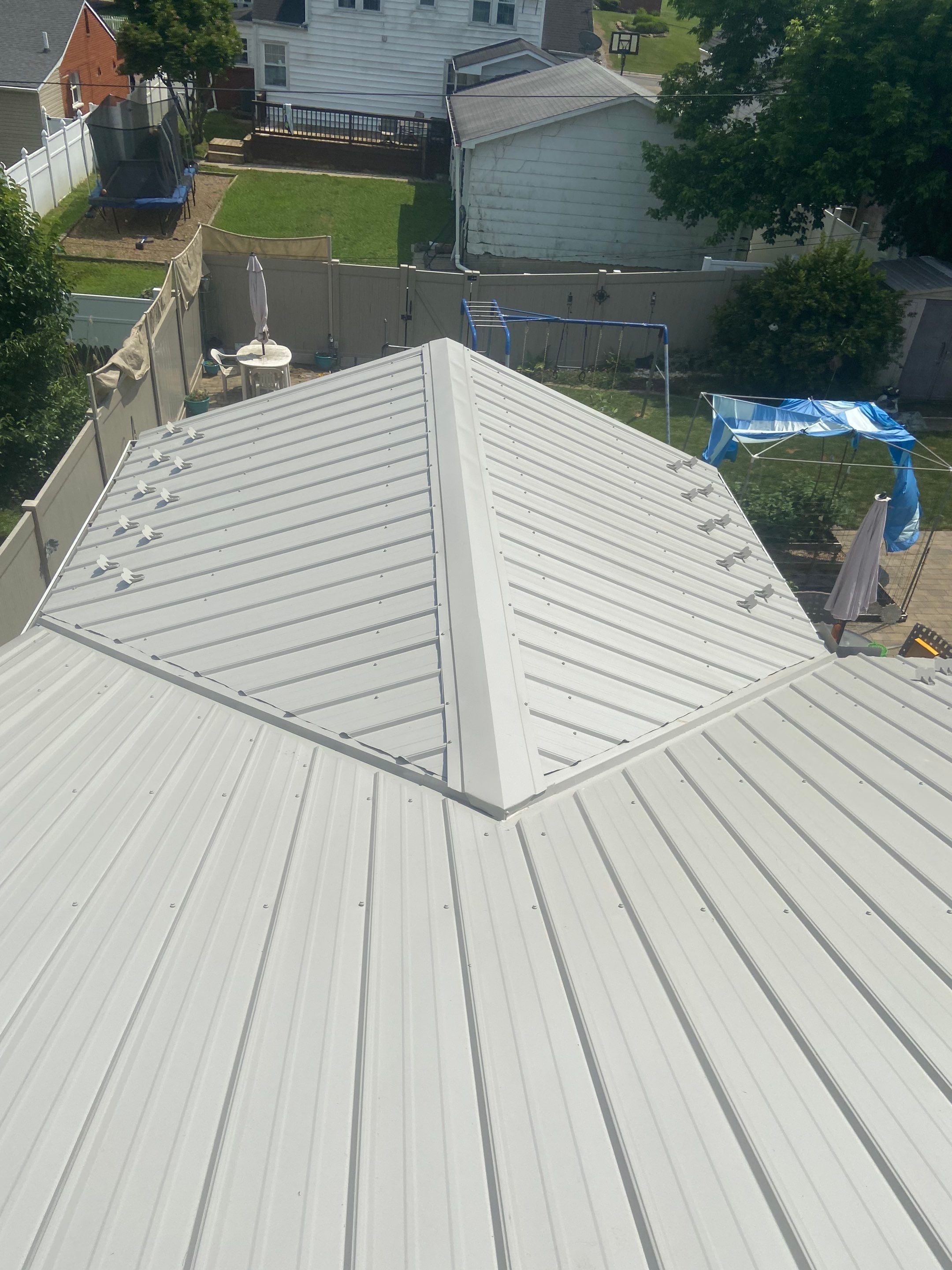 Metal Roofing, Skylights, Porch Build by Secure Construction Company Inc