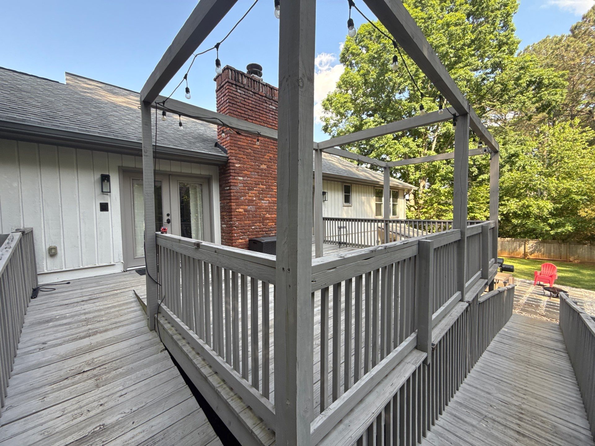 Deck and Shed Roof Style Covered Build using Trex Decking Products by Nelson Exteriors 