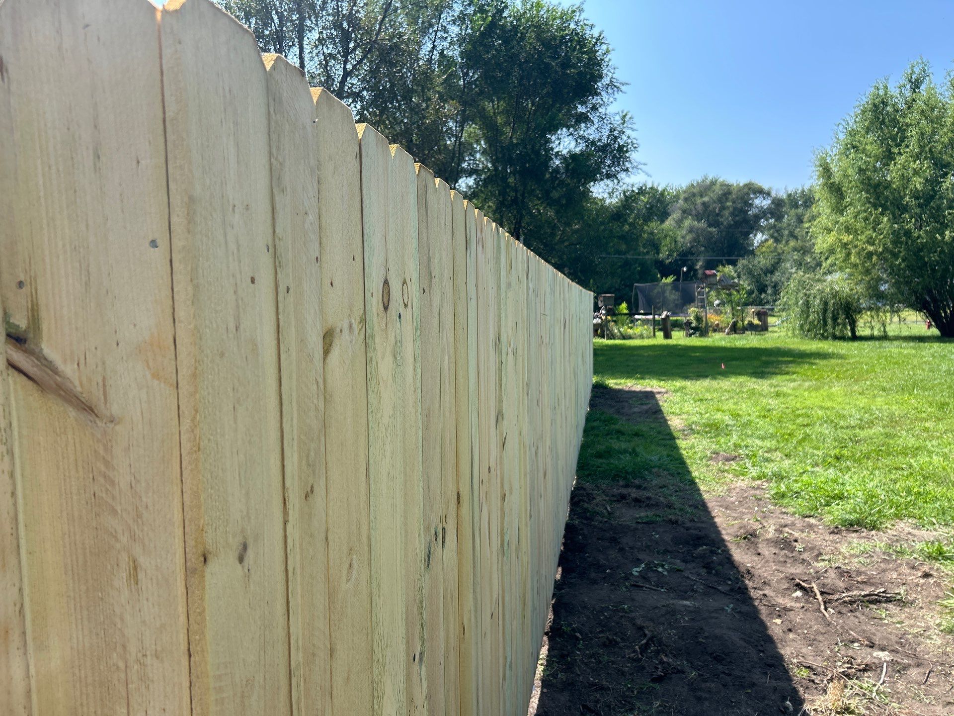 Treated Pine Privacy and Picket Fence Installation in Evansdale by Perfect Picket Fence and Stain