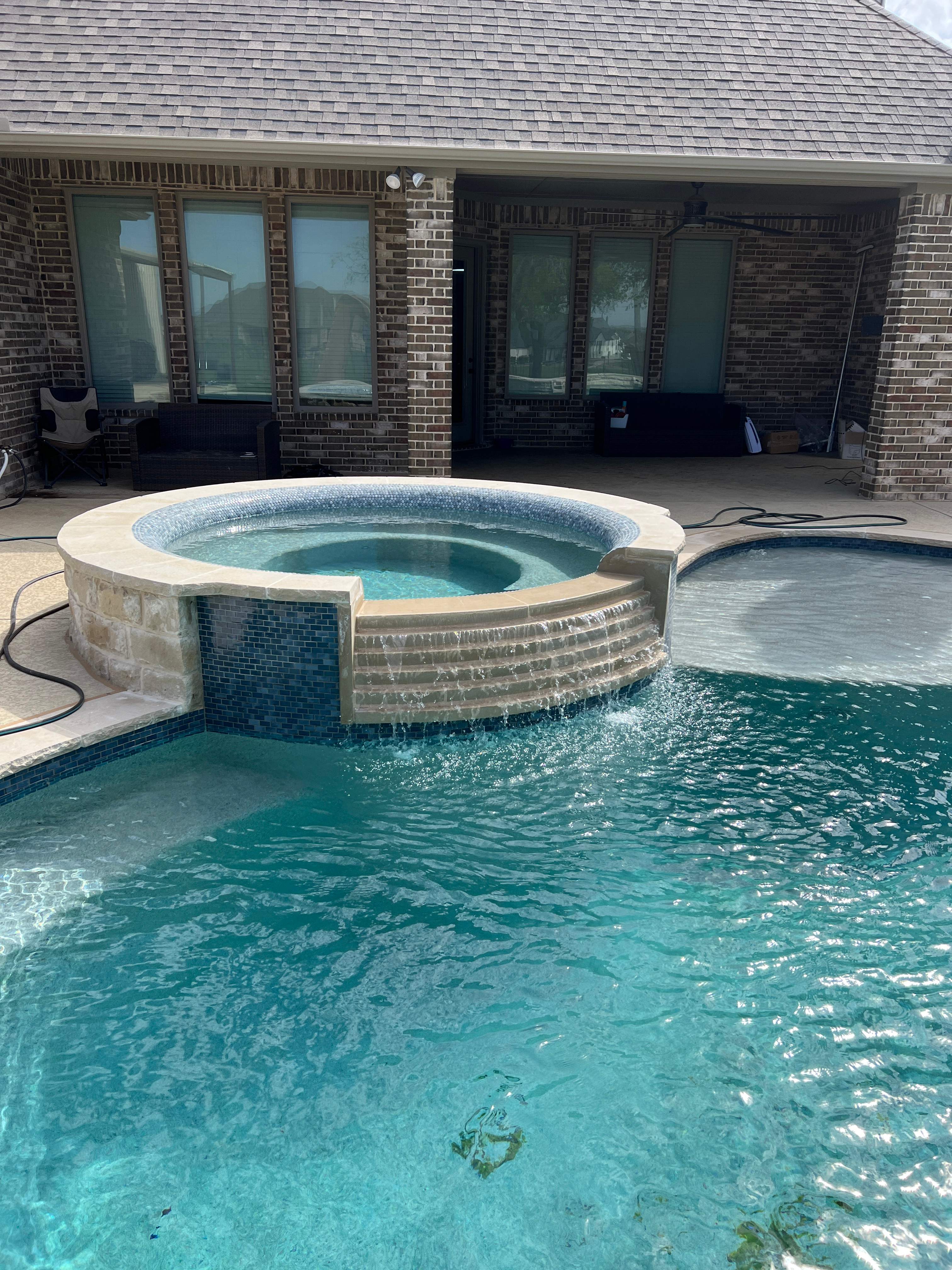 Freeform Pool with Raised Spa and Tanning Ledge by Pinnacle Pools and Spas - DFW