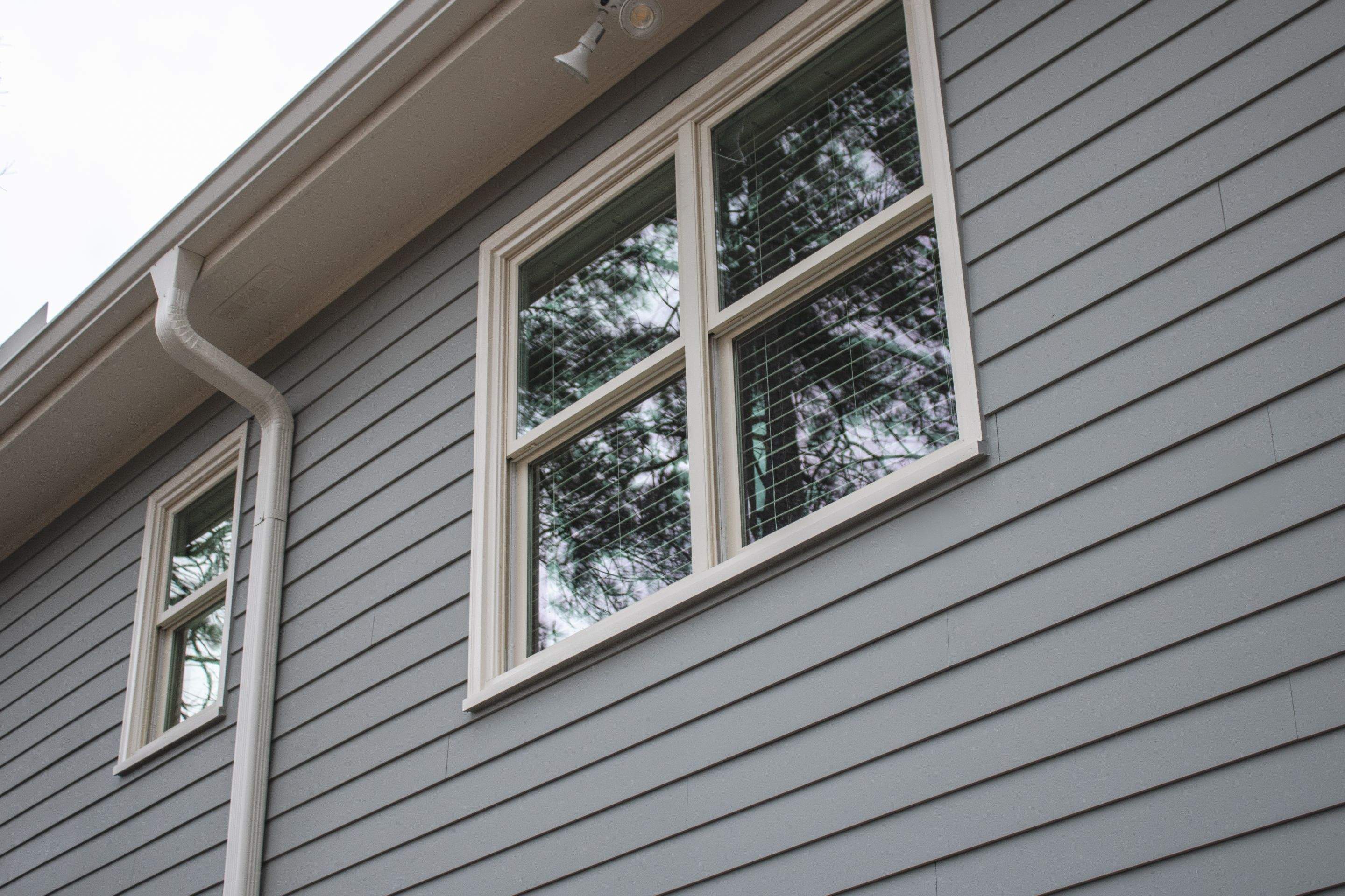 James Hardie Siding Replacement, Exterior Painting, Deck Stain, and Gutter Installation in Peachtree Corners, GA by Nelson Exteriors