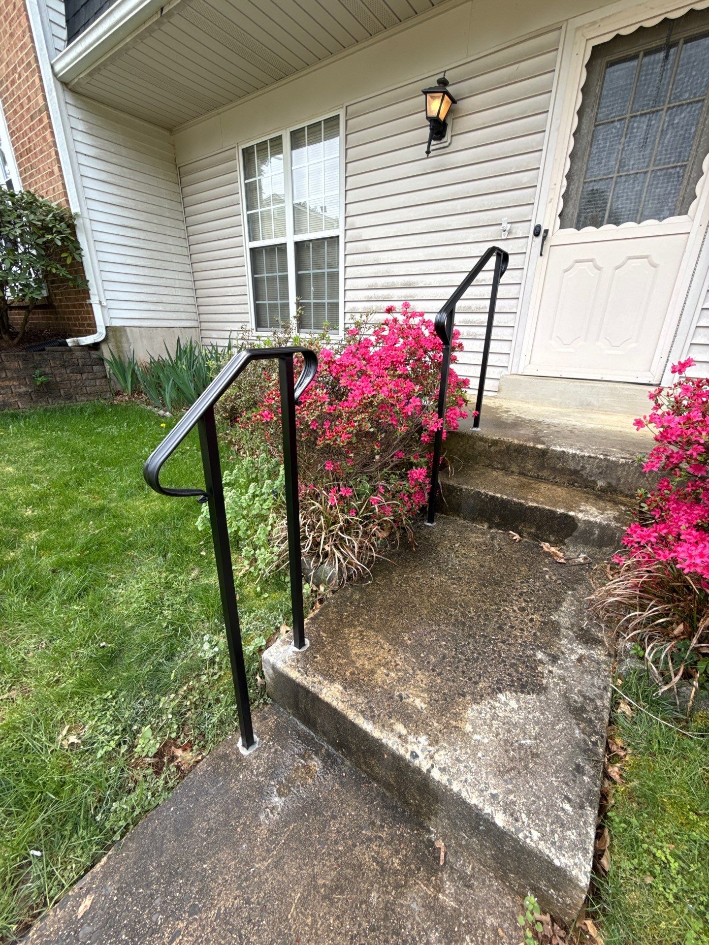 Custom Black Metal Exterior Handrail Installation in Olney by Capitol Iron Works