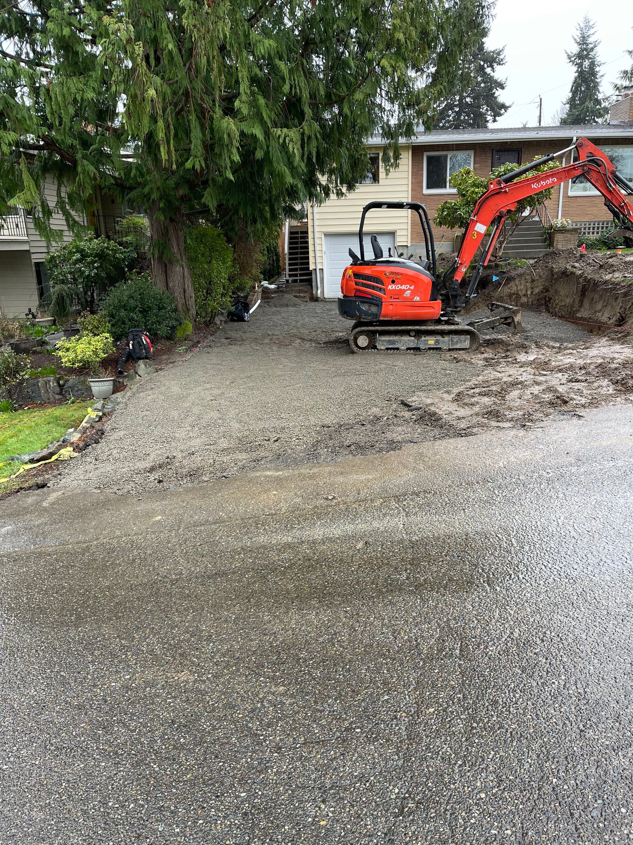 Lorra | Asphalt Driveway Repair & Retaining Wall by Jireh Asphalt & Concrete Inc 