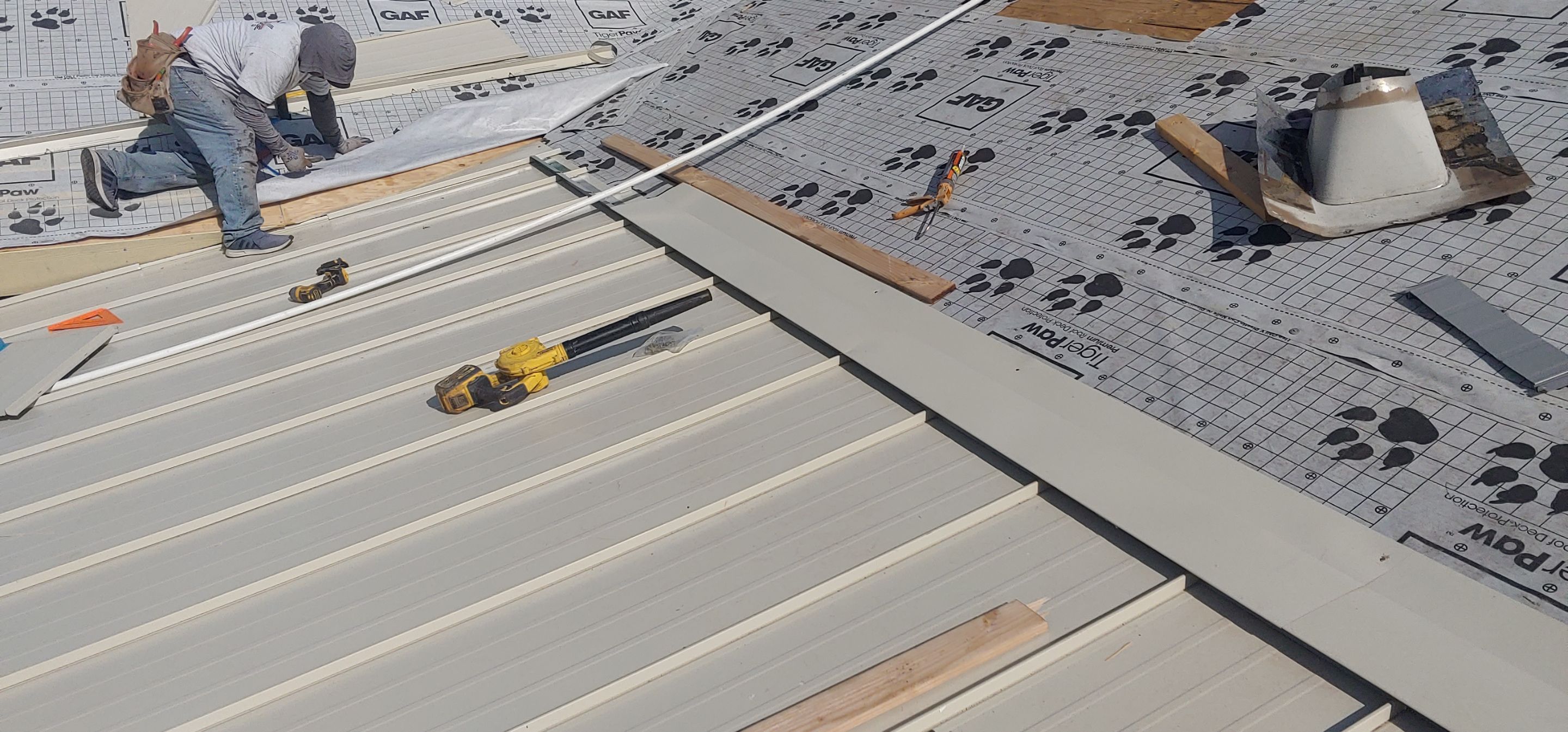 Residential Roofing Installation using Standing seam metal roofing system by Straight Edge Roofing Inc