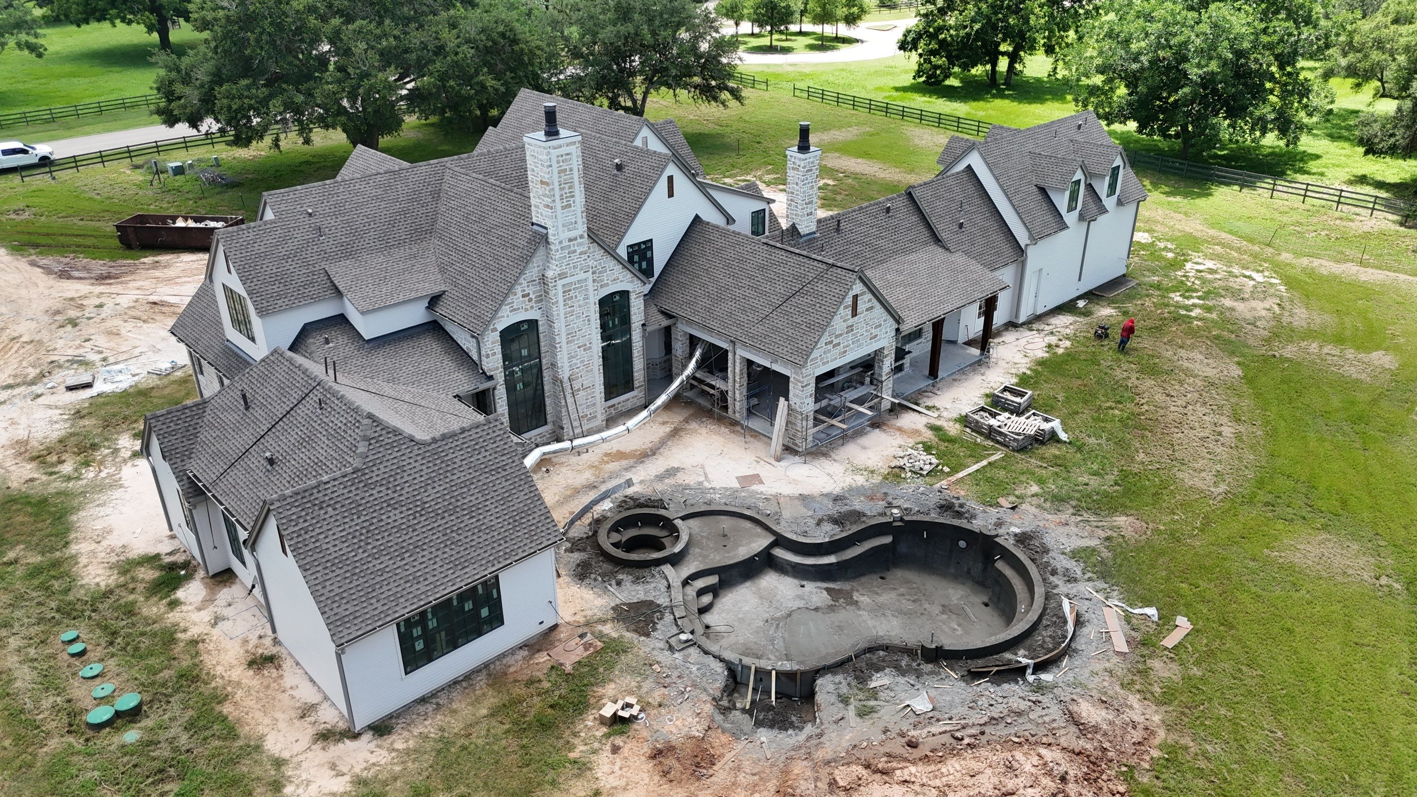 Custom home roof in Fulbrook by Level 7 Companies