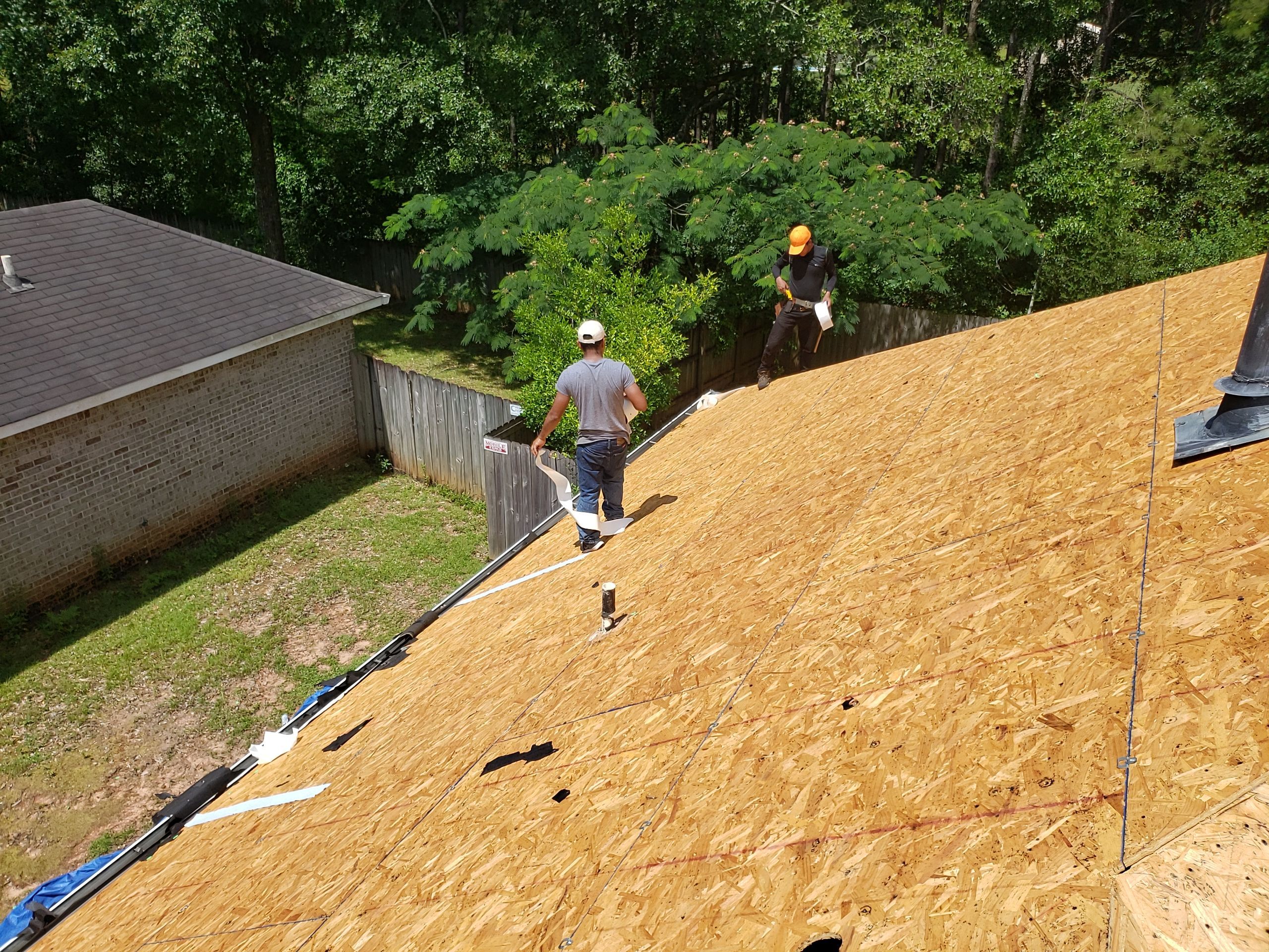Residential Roofing Installation using Roof Replacement by American Roofing & Construction LLC