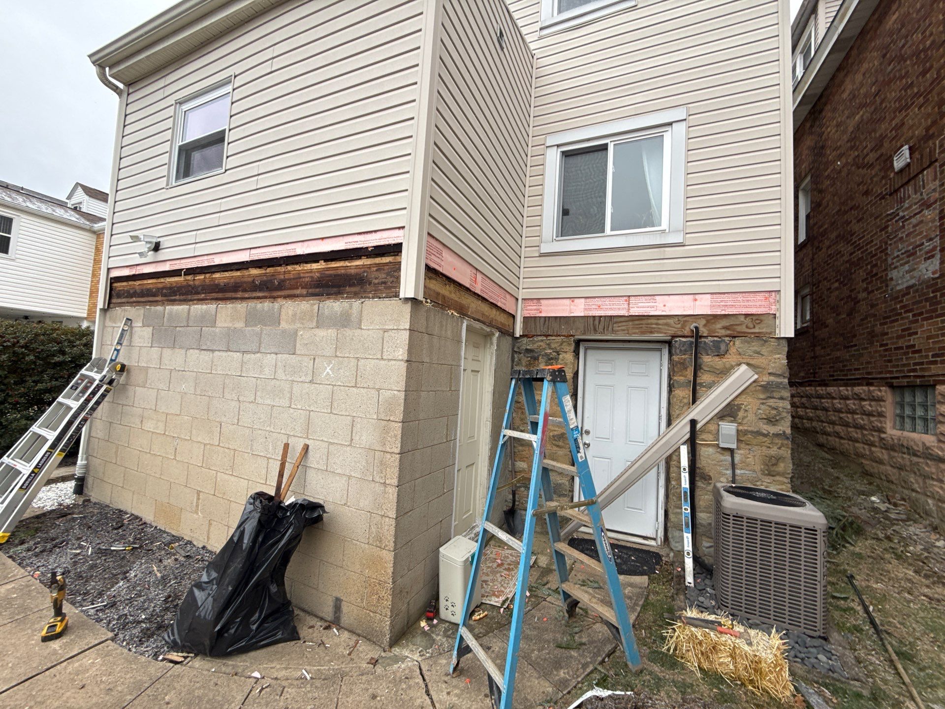 Deck and door by Cousins Roofing Siding & Decks