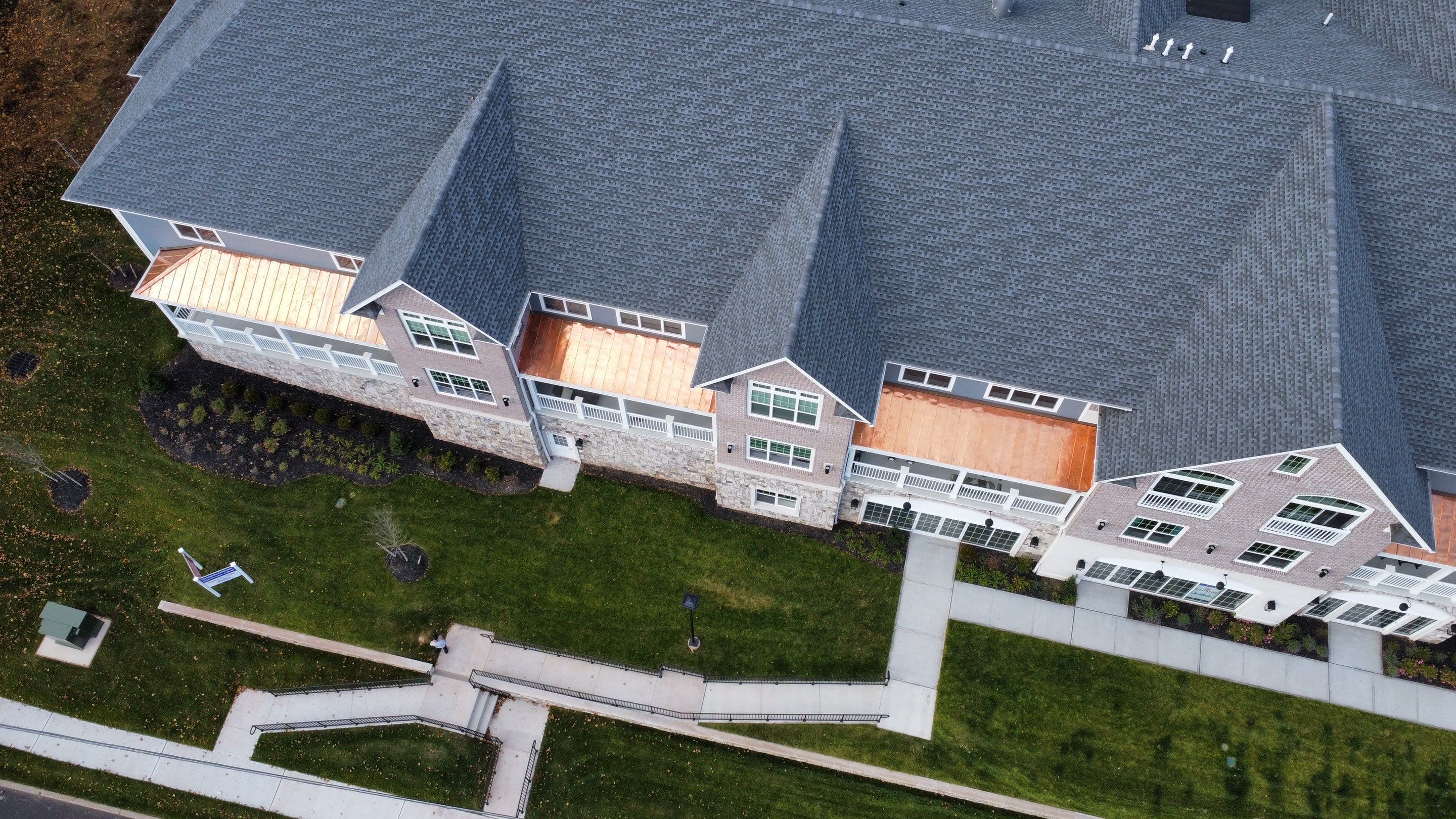 Standing Seam Metal Roof using Copper by CMNG LLC