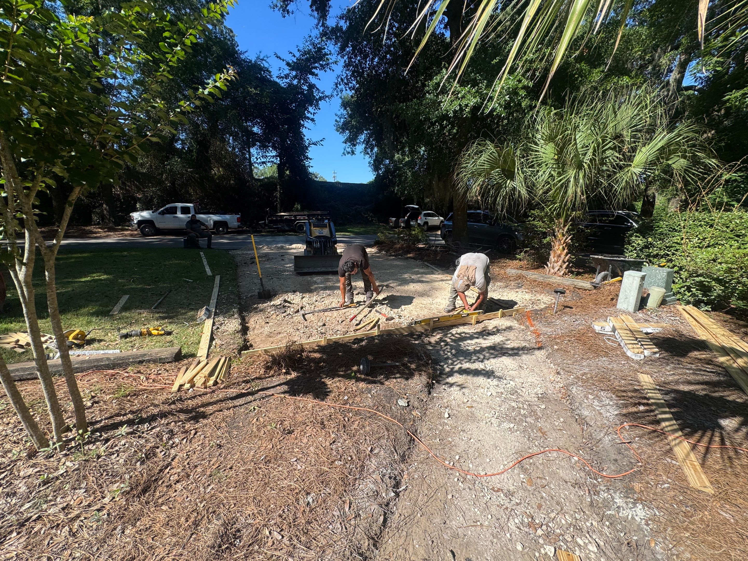 Custom Concrete Patio and Herringbone Paver Walkway in Hilton Head Island by Lowcountry Scapes, LLC
