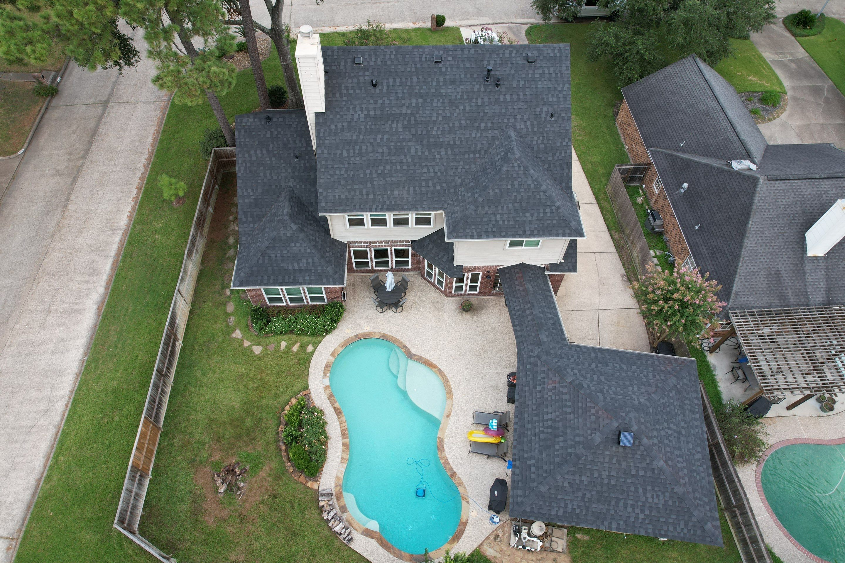 IKO Dynasty Granite Black by STX Roofing