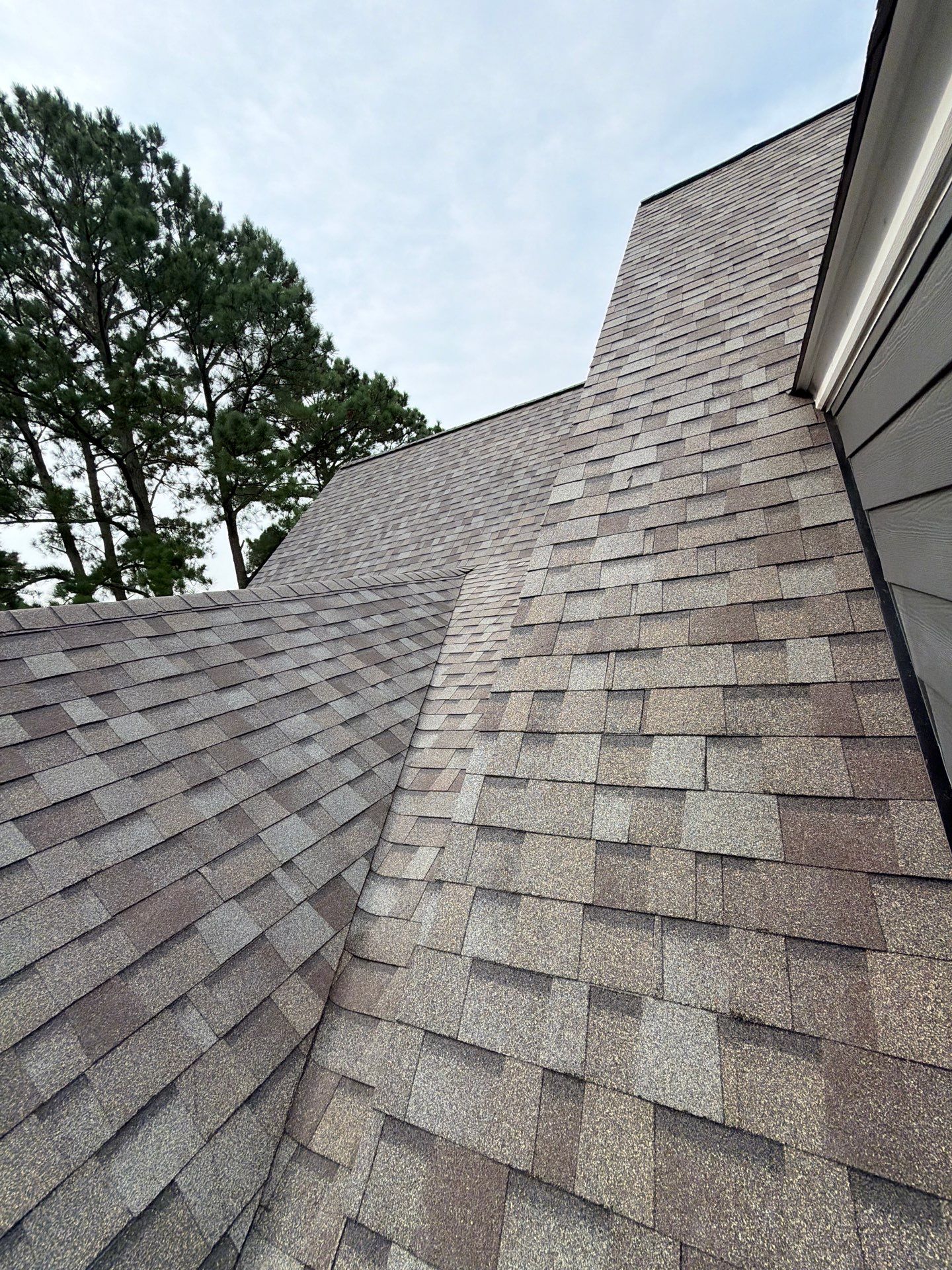 Roof Replacement and White Gutter Installation in Gloucester by Cade Construction