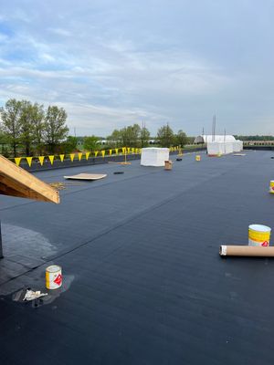 Commercial Roofing Installation using 60 mil rubber roof 
