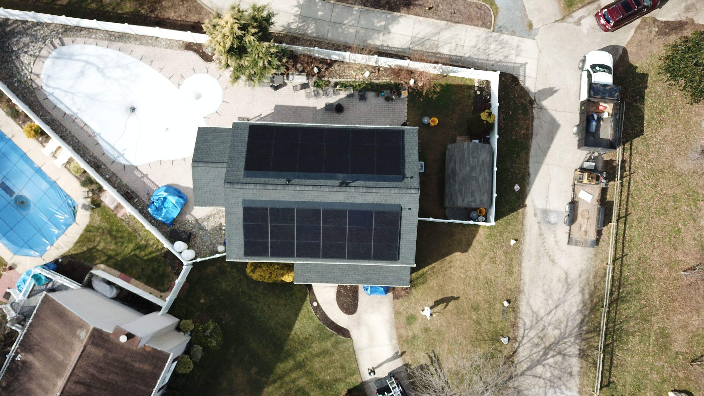 Roof Replacement with GAF Decotech integrated solar panels by American Home Contractors