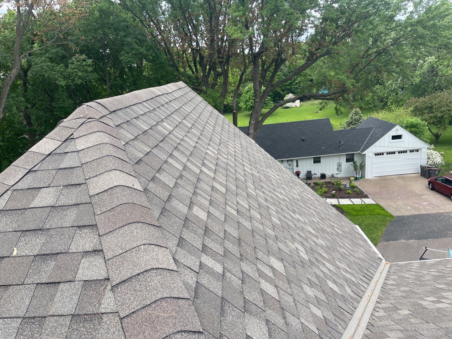 Chanhassen, MN – Roof Replacement with Gutter Guard Upgrade by First Impressions Exteriors