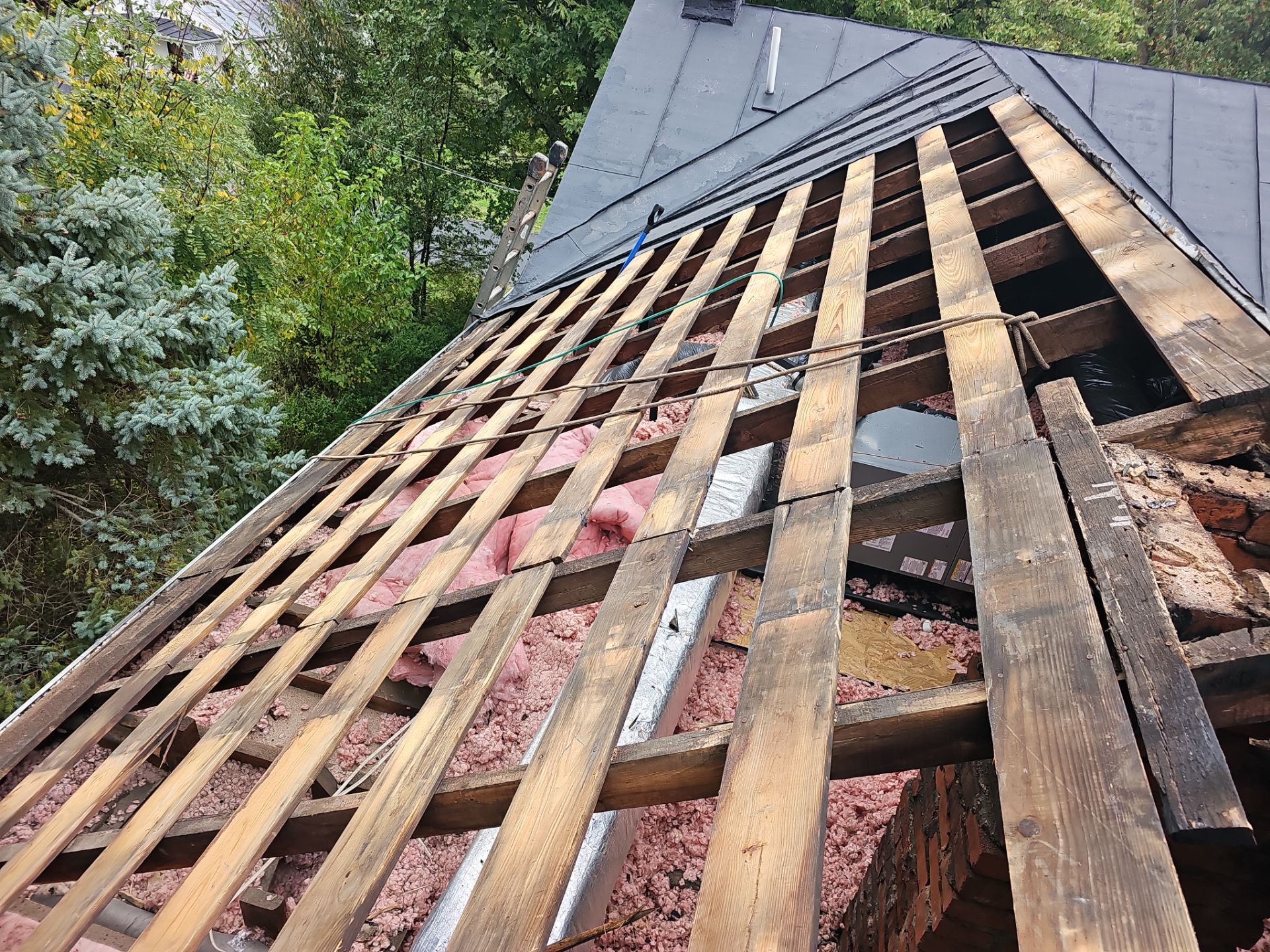 Metal Roof and Gutter Replacement by Winchester Roofing