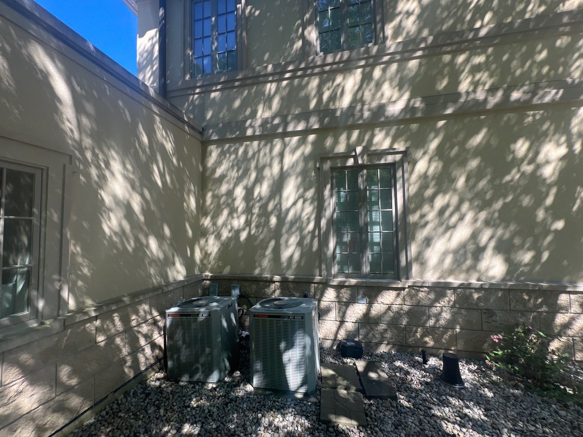 concrete cleaning using Algaecide, soft wash soap by Northern Power Washing LLC.
