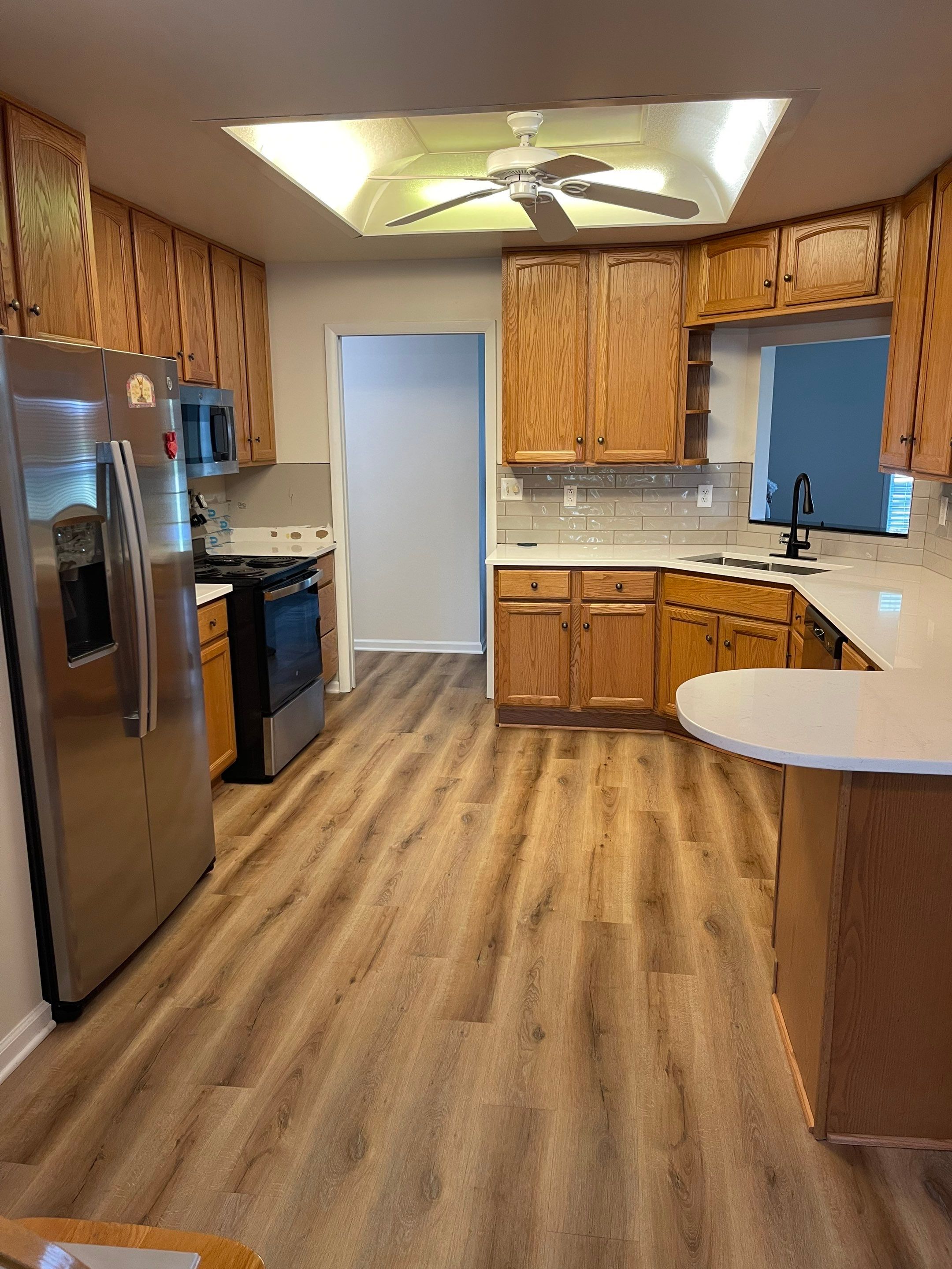 Carl Gray Kitchen by Integrity Tile and Home LLC