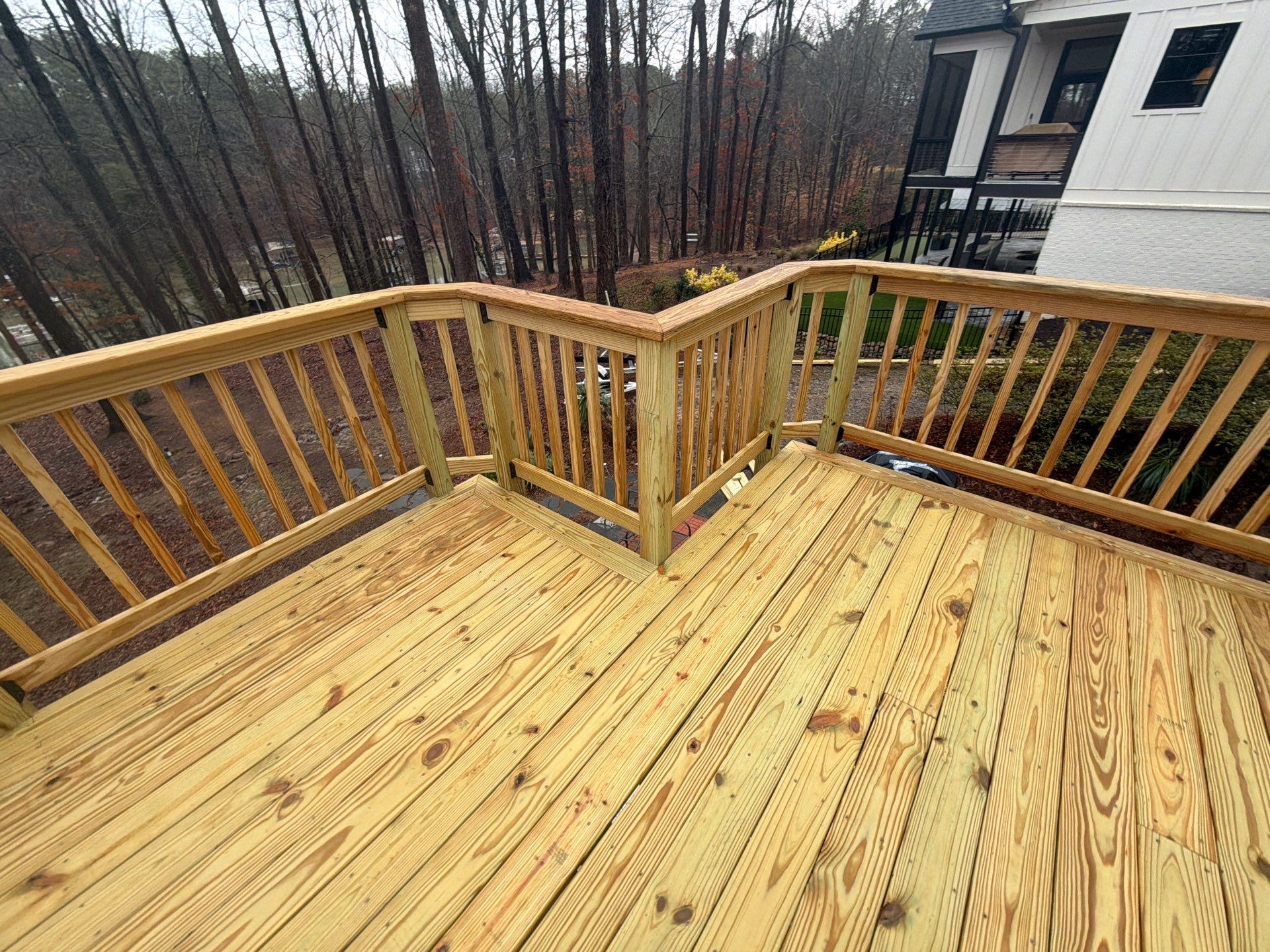 Buford, GA Deck Resurface and Extension using Pressure Treated Pine by Nelson Exteriors