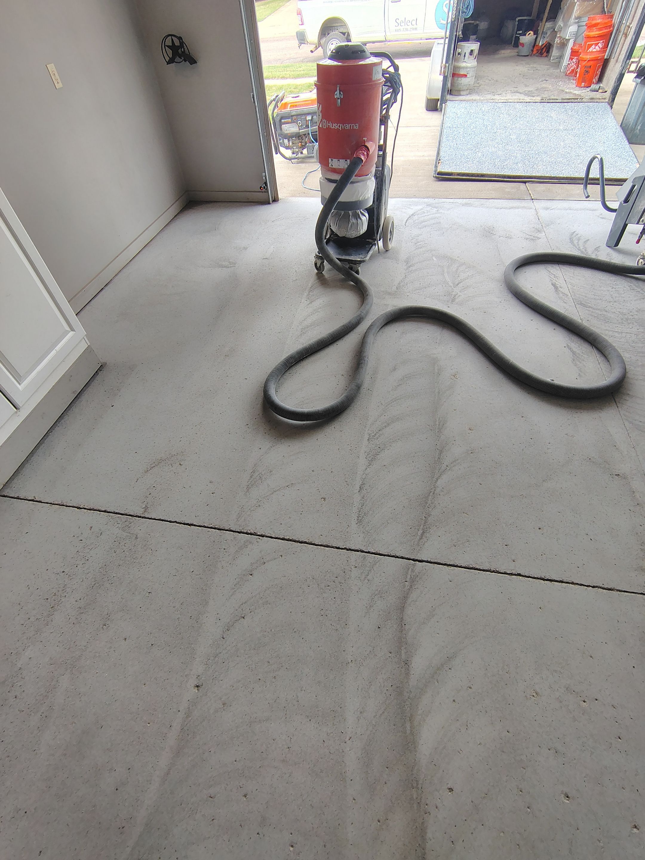 Multi-Colored Speckled Epoxy Concrete Coating for Residential Garage by Select Painting, Coatings & Garage Cabinets