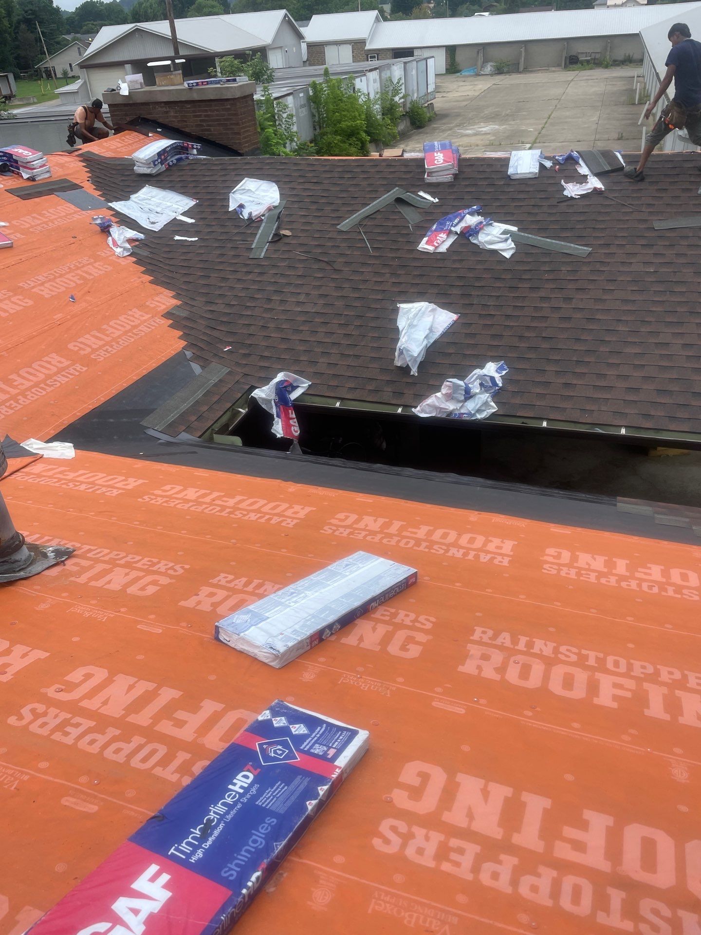 Residential Roofing Installation using GAF TImberline HDZ Hickory by Rainstoppers Roofing