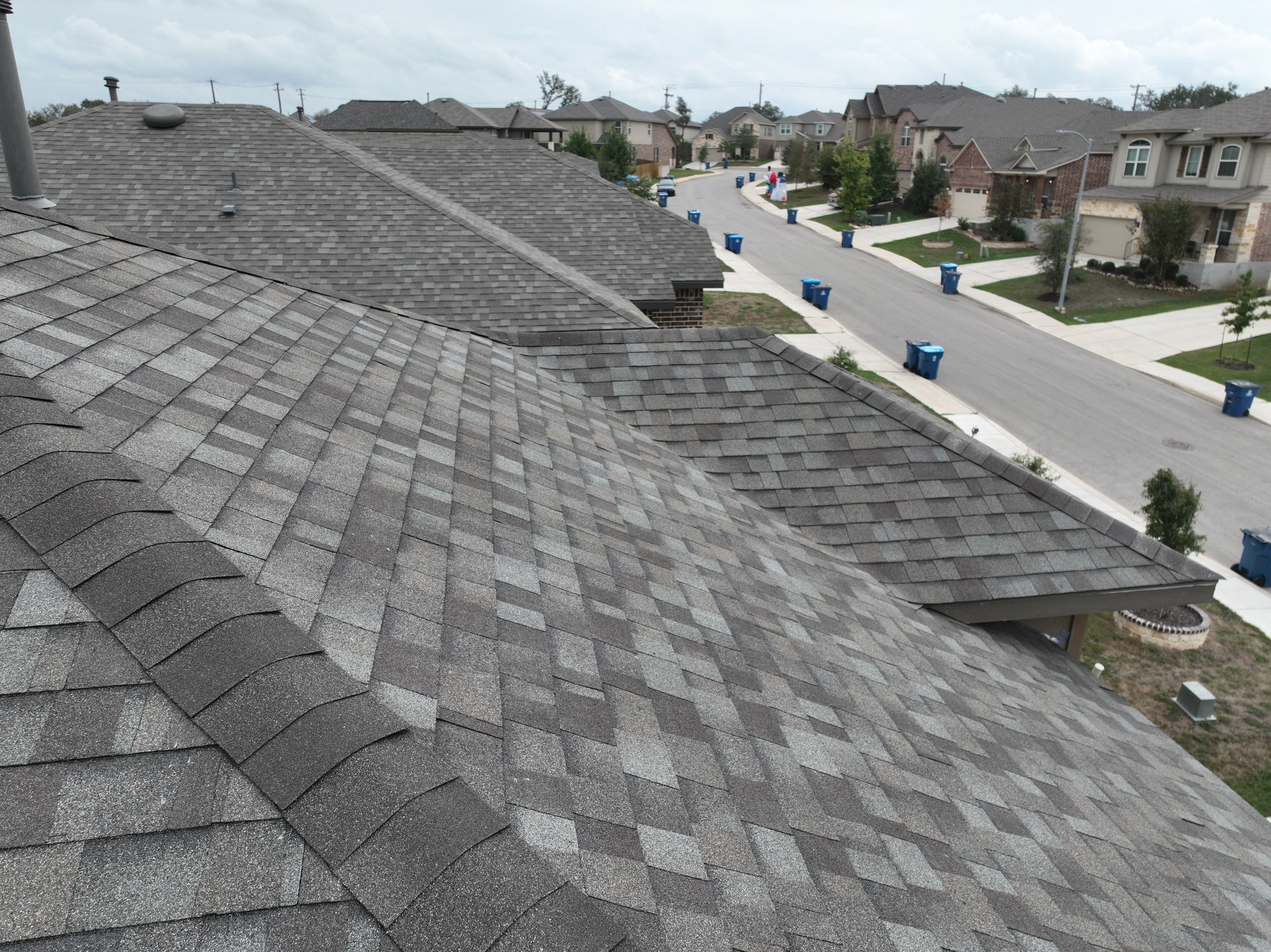 Residential Roofing Installation using Owens Corning 30 year Architectural Shingles by Premier Roofing and Contracting