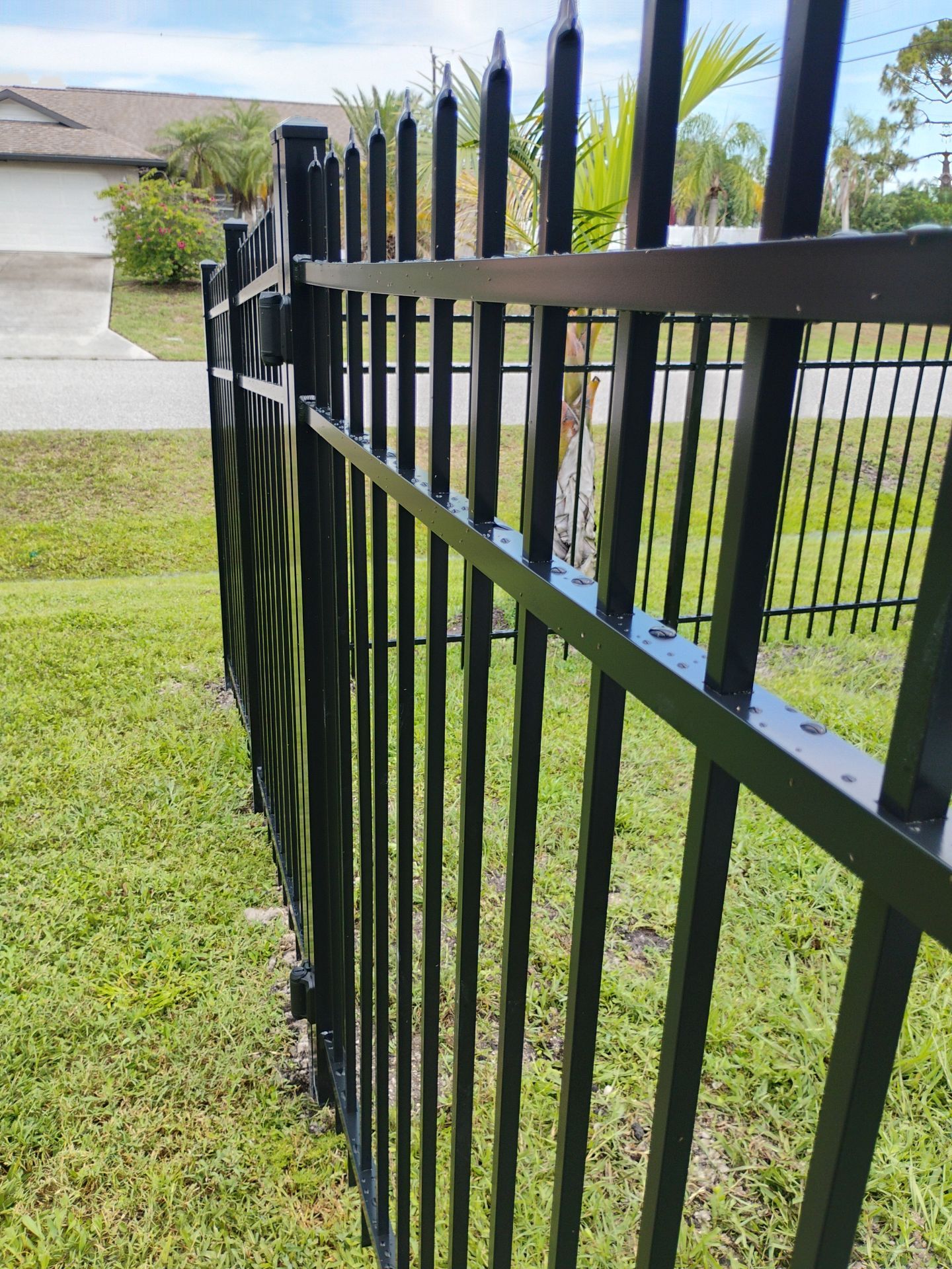Black Aluminum Spear Top Picket Fence Installation in Englewood by True Fence LLC
