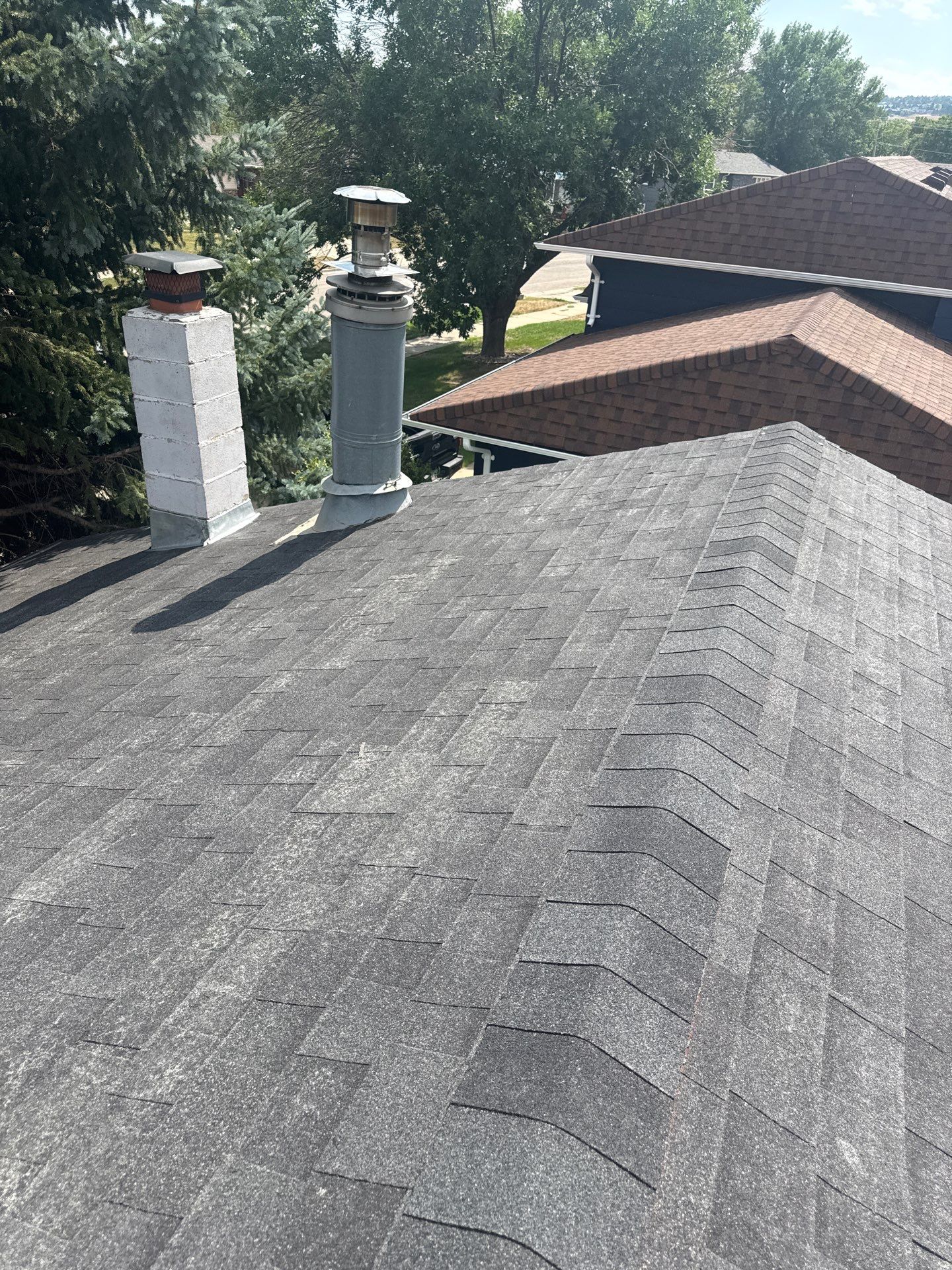 Full Architectural Shingle Roof Replacement and Gutter Installation in Rapid City by Weather-Tite Exteriors LLC