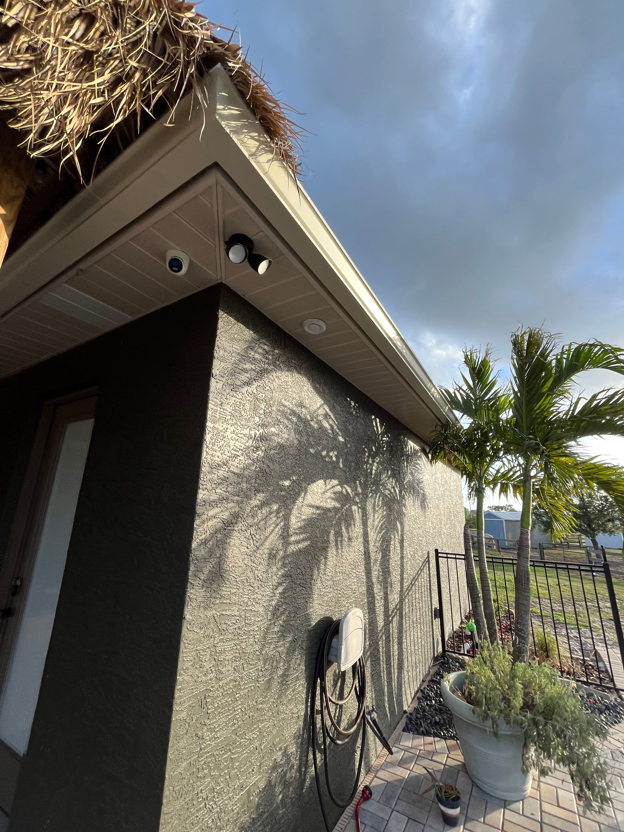  7-inch White seamless gutters and downspouts in Myakka City FL by Gutter Professors