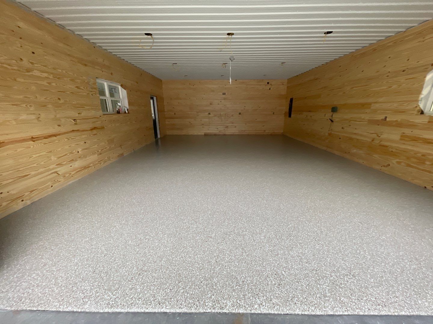 Garage and Carport in Chiefland, FL in Pebble Beach by Cross Creek Concrete Coatings