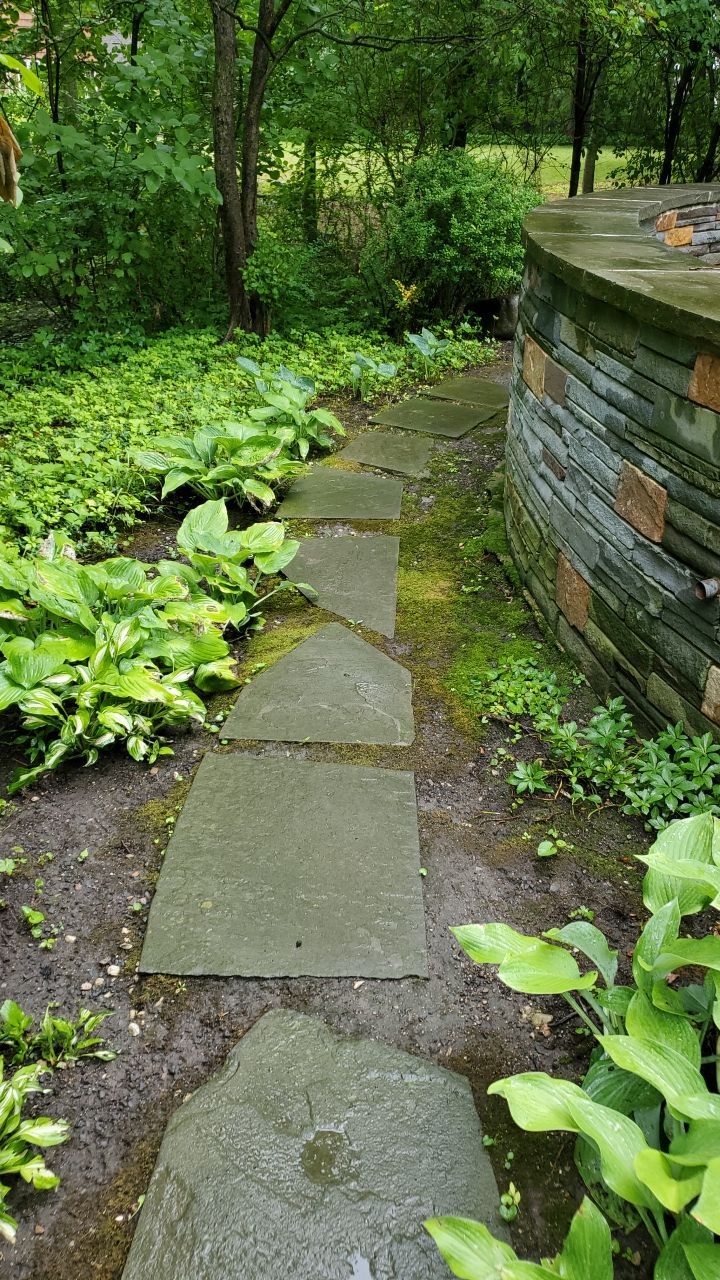 Bluestone patio cleaning by Northern Power Washing LLC.