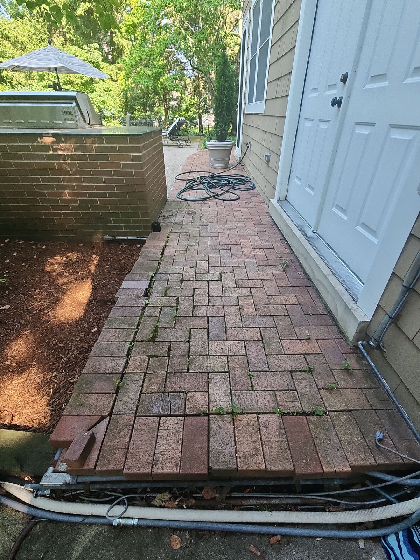 Highland Park brick cleaning by Northern Power Washing LLC.