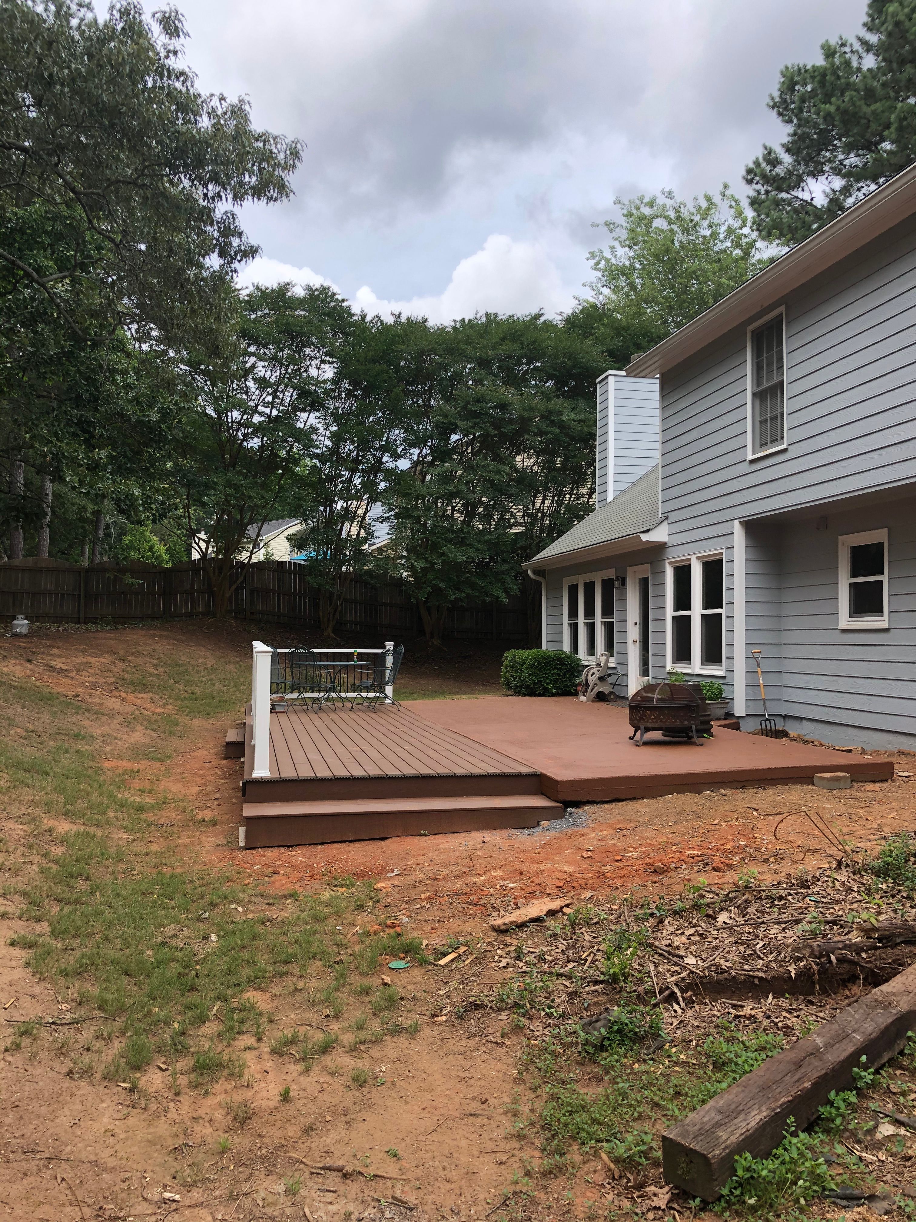 Composite Deck Replacement with White Railings in Duluth by Swift Home Renovations