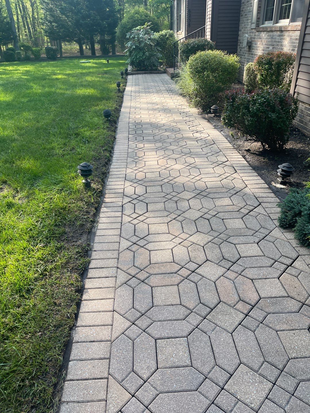 Pavers Cleaned, Garage and Concrete walls by SJ Exterior