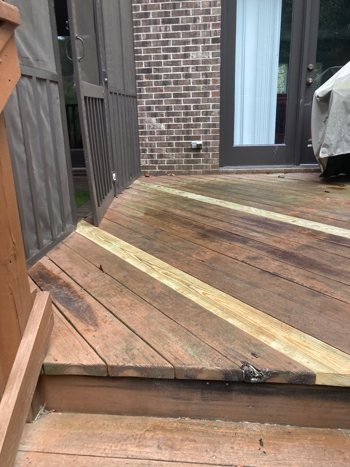 Deck and Fence Stain with Deck Board Repairs in Atlanta, GA by Nelson Exteriors 