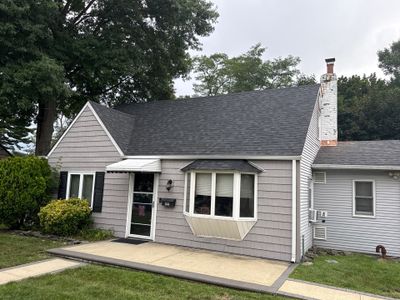 Dark Asphalt Shingle Roof Replacement on Farmingdale Residential Home