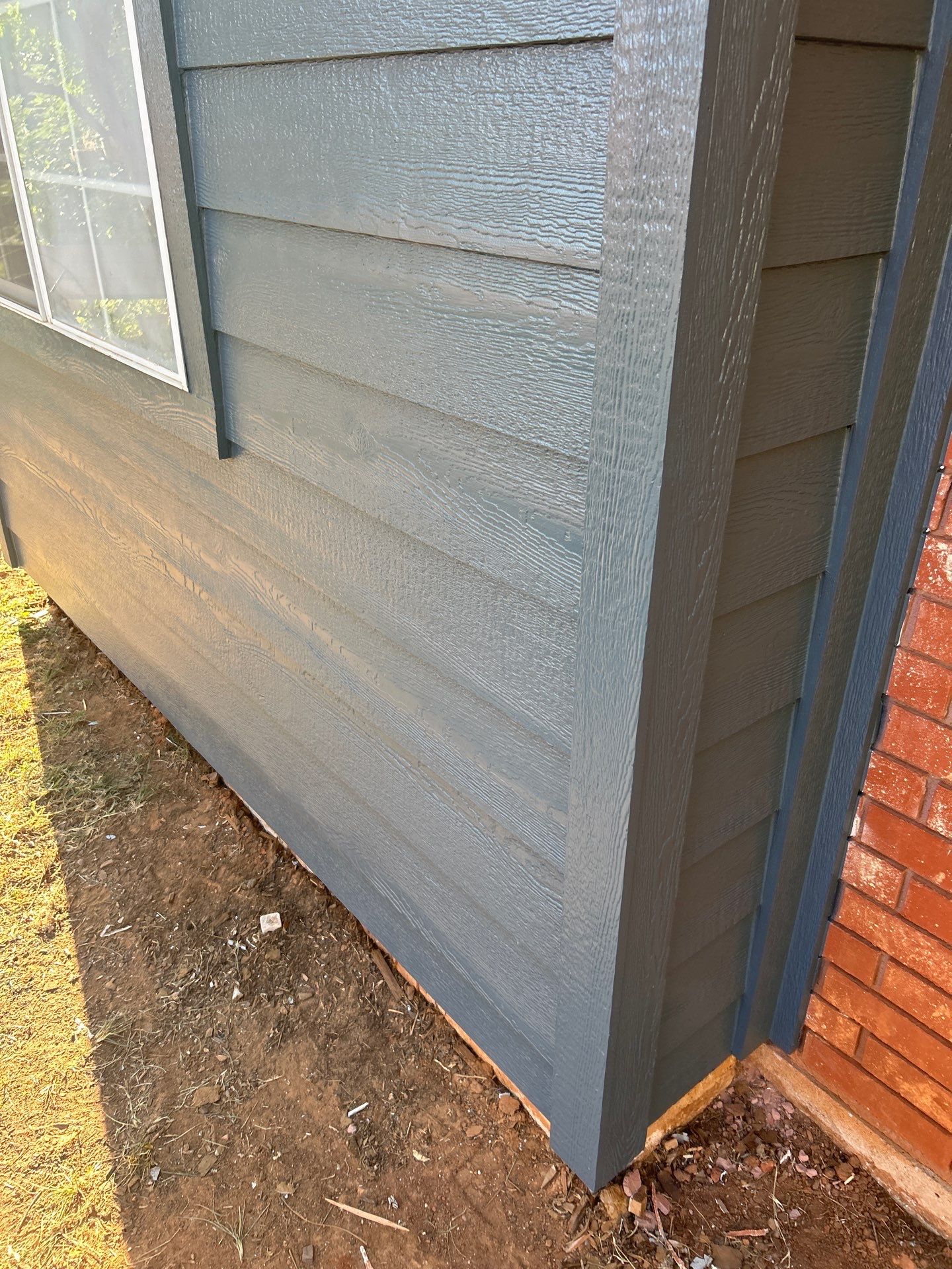 Siding Replacement and Exterior Painting in Edmond, OK by McCann's Roofing and Construction