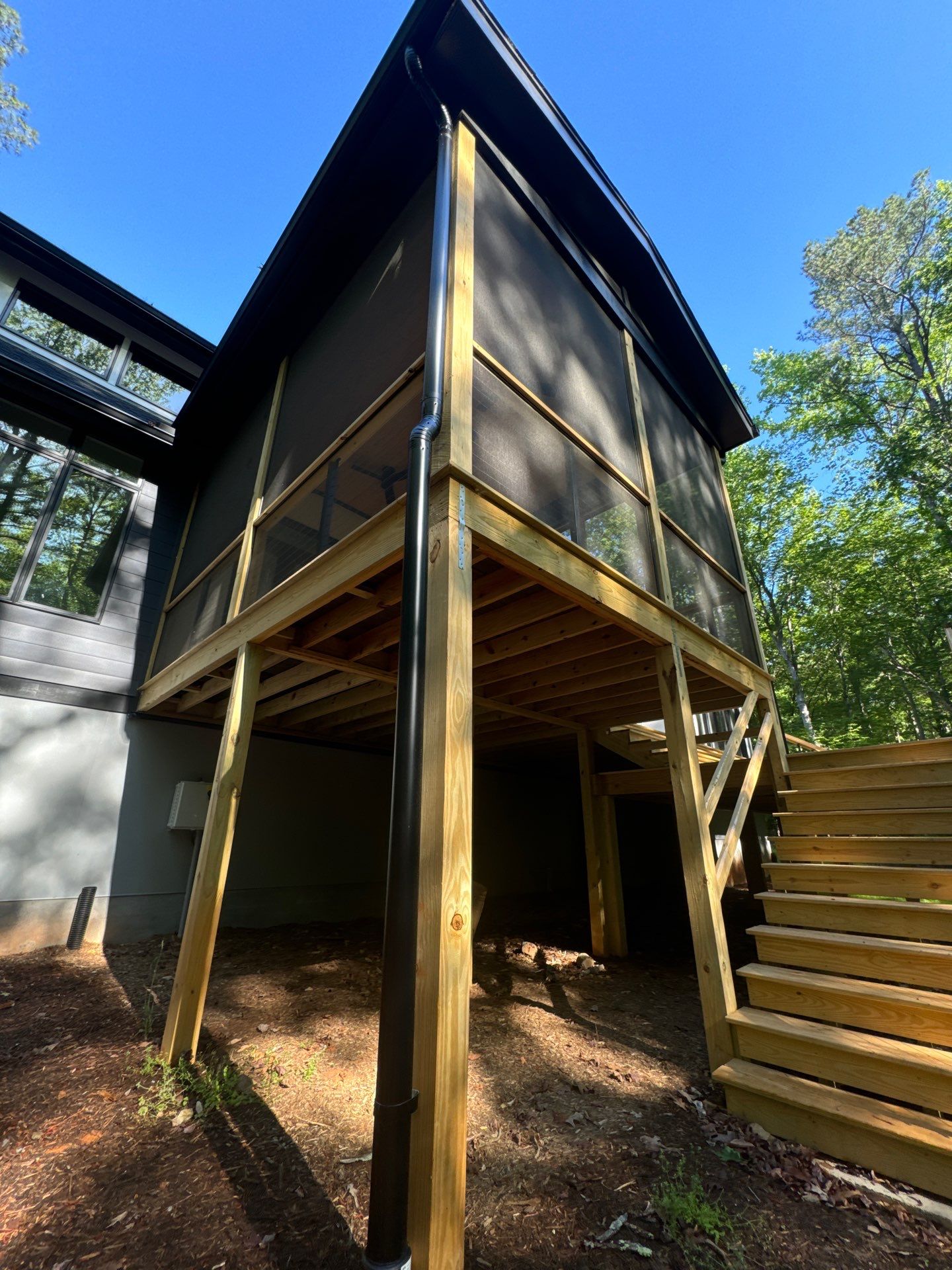 Porch and Deck staining  by GonzalezPainters & Contractors Inc 