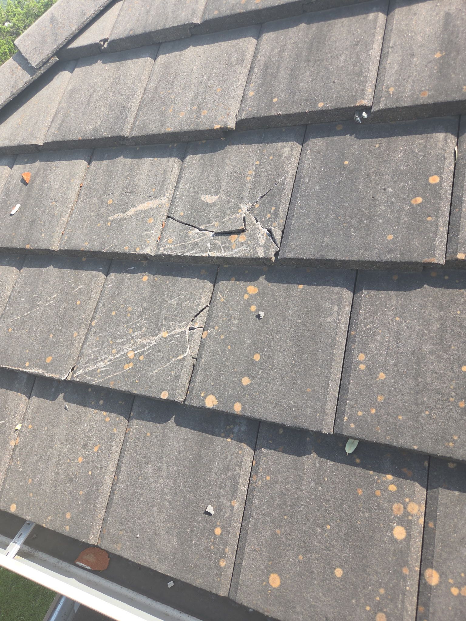 Tile roof and custom chimney cap by REPS Austin Area Roofer